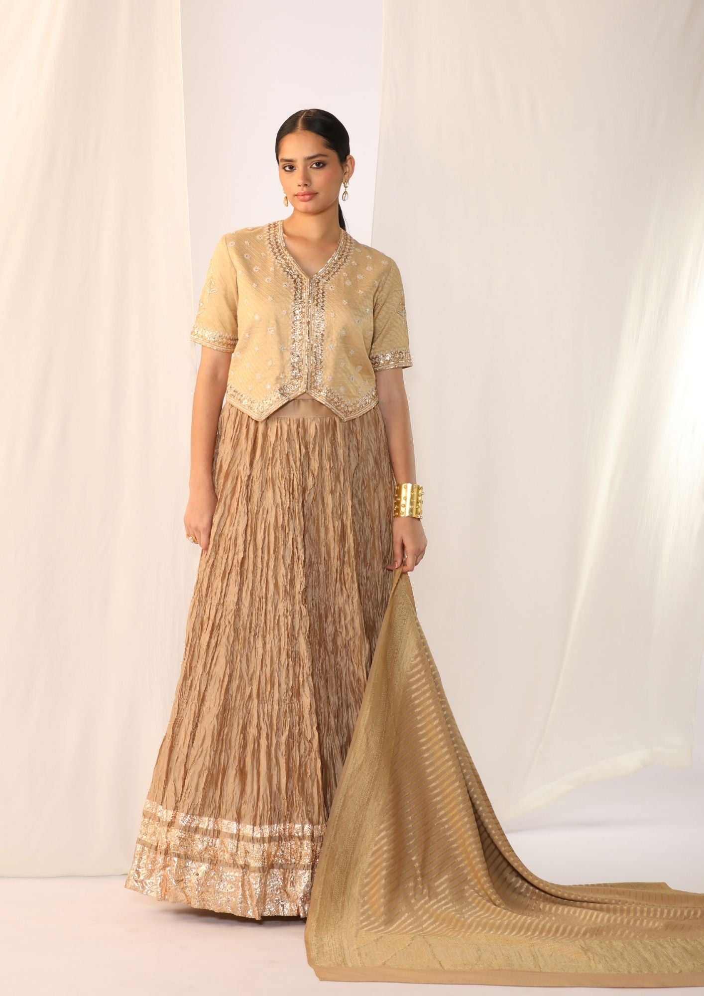 Brocade Waistcoat Paired With A Crushed Skirt With Benarasi  Dupatta