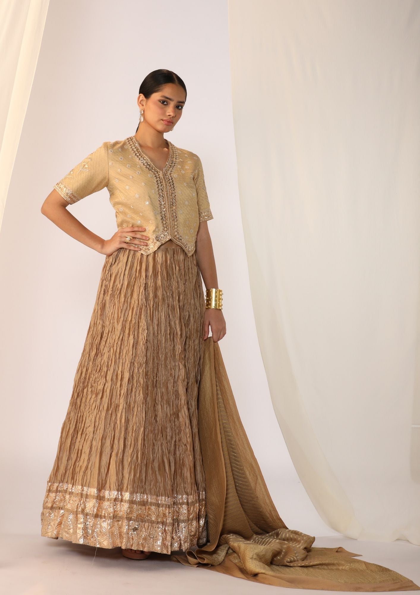 Brocade Waistcoat Paired With A Crushed Skirt With Benarasi  Dupatta