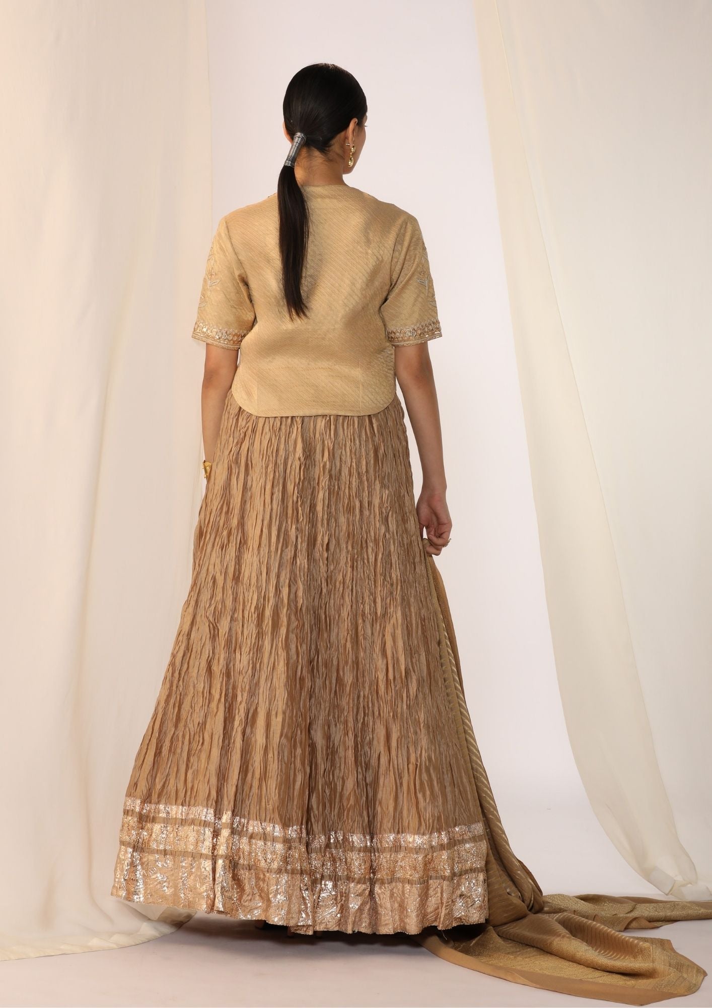 Brocade Waistcoat Paired With A Crushed Skirt With Benarasi  Dupatta