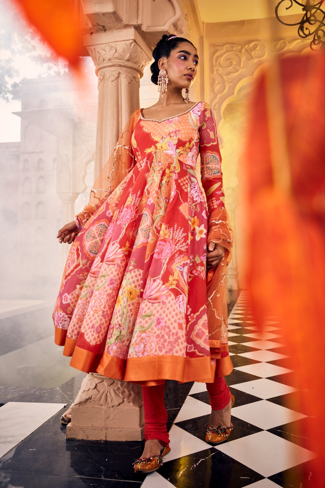 Red Multi-Printed Anarkali Featuring Intricate Kangdi Work On The Neckline