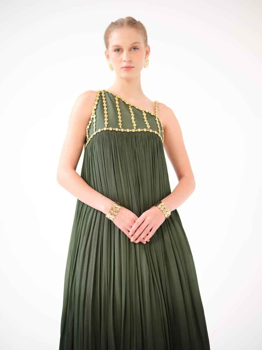 An asymmetric one-shoulder dress