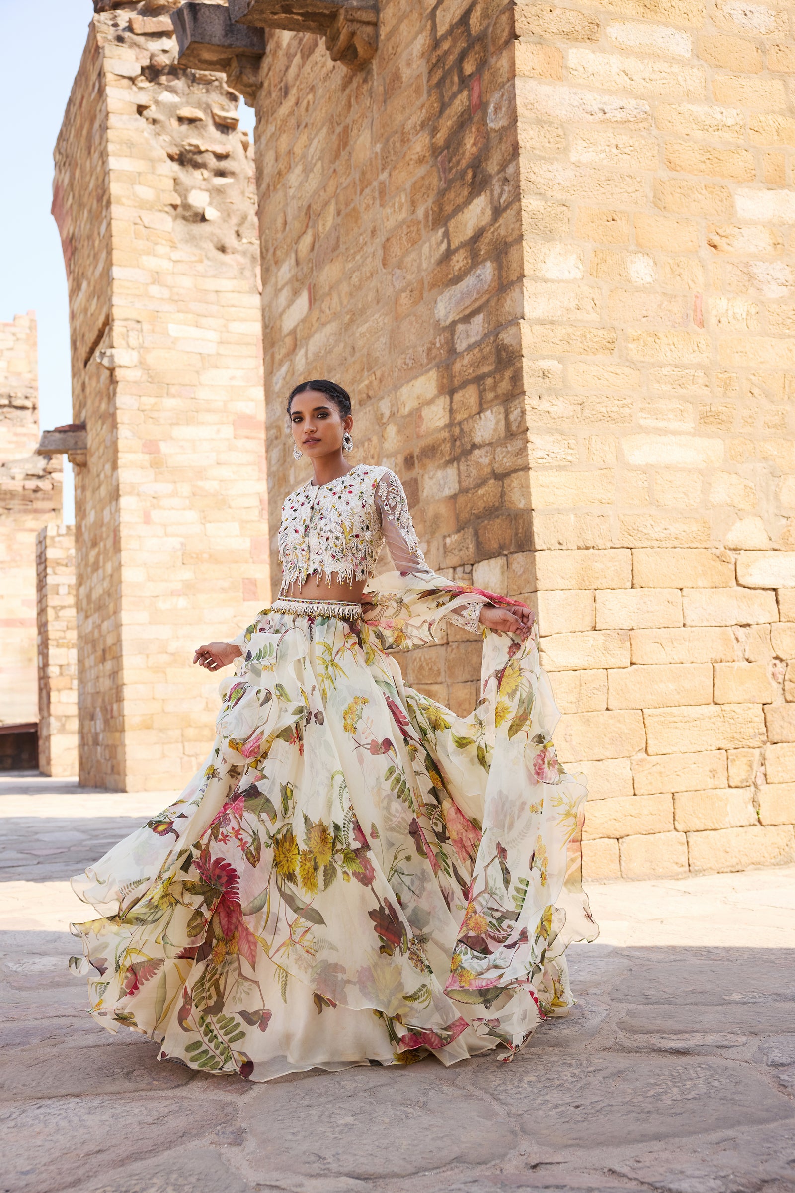 Ivory Printed Embellished Top Paired With Skirt