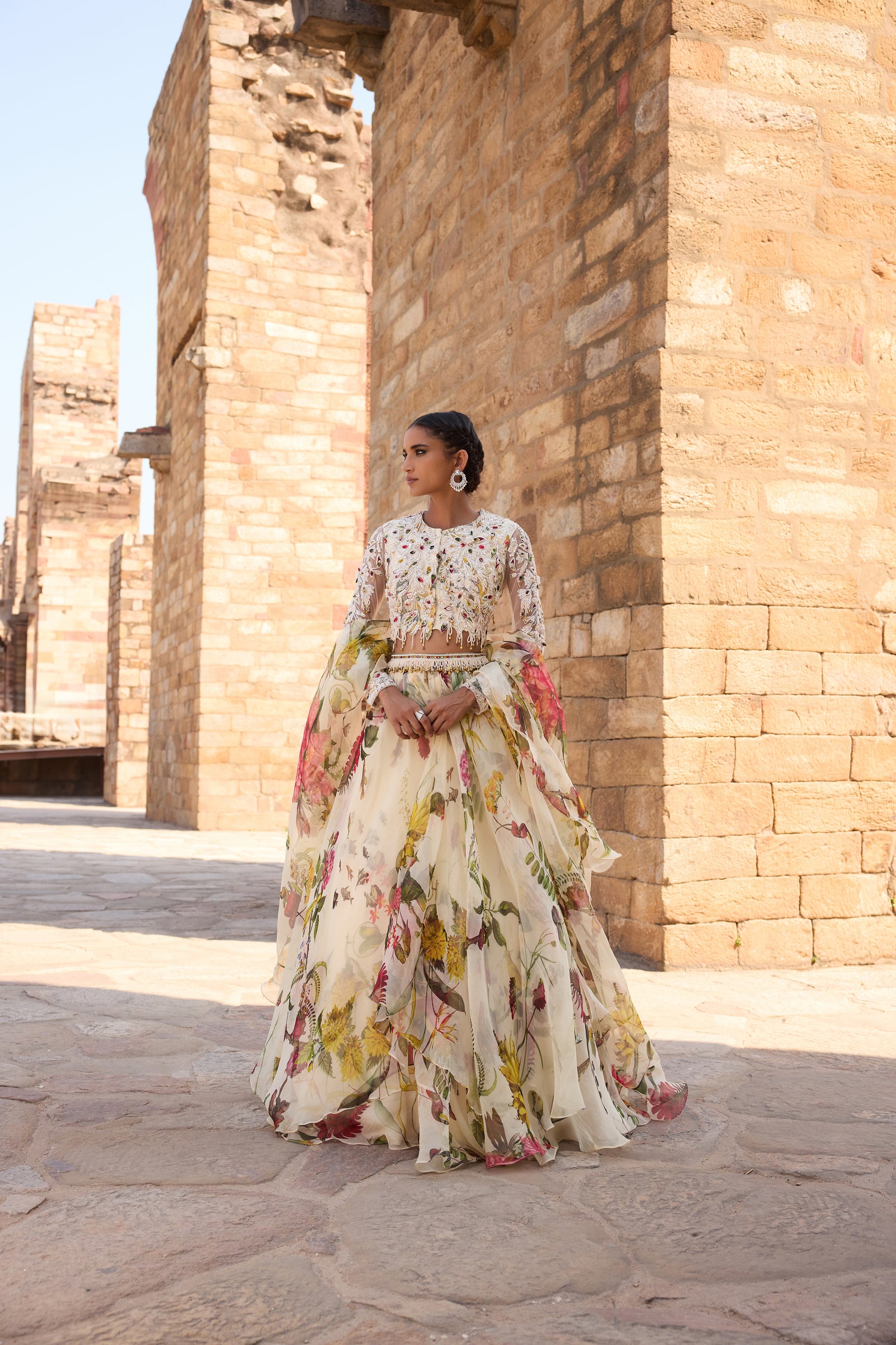 Ivory Printed Embellished Top Paired With Skirt