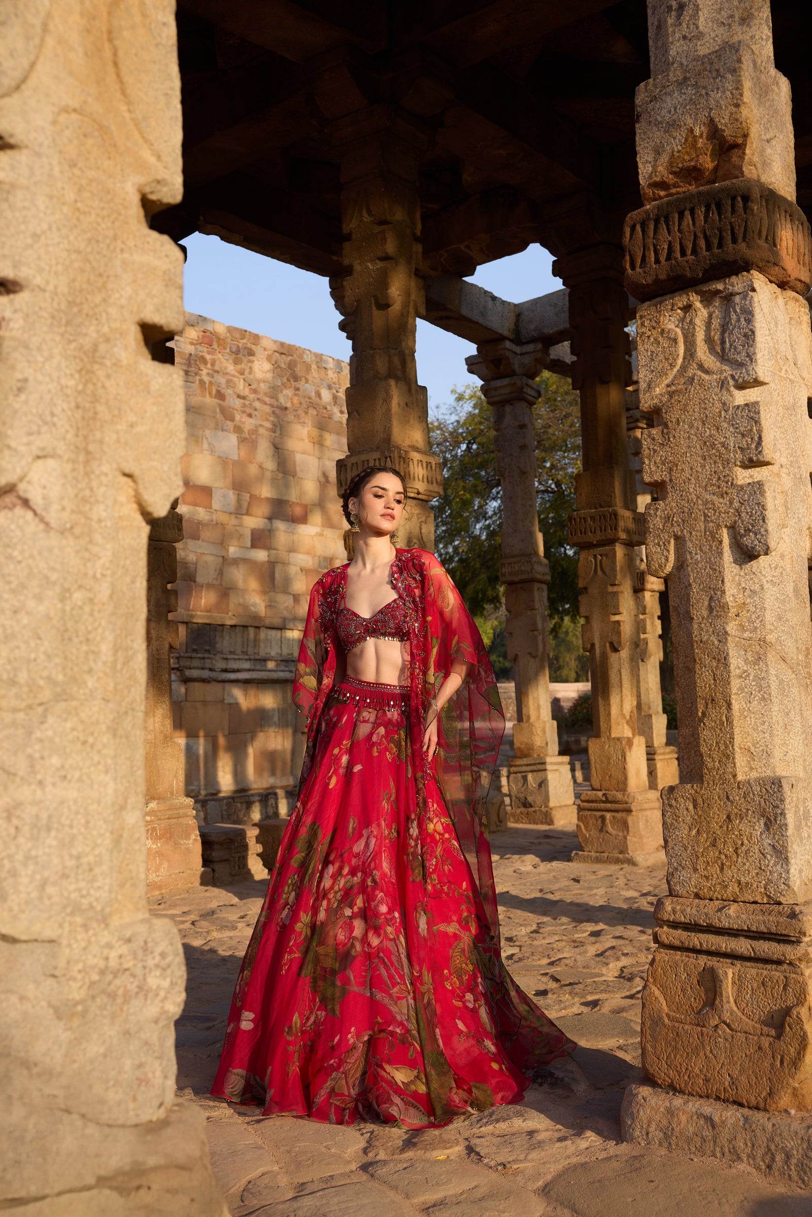 Fuchsia Printed Embellished Cape Set Paired With Skirt And Embellished Bustier