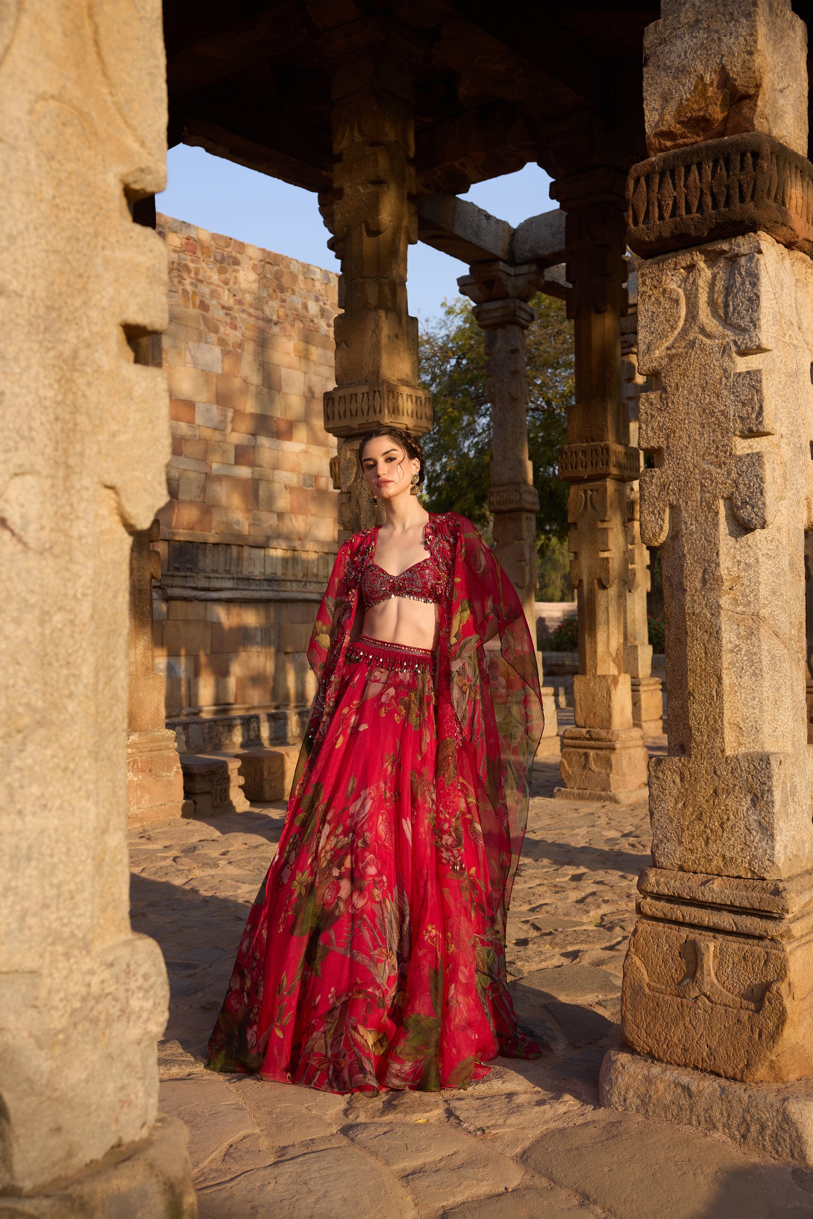 Fuchsia Printed Embellished Cape Set Paired With Skirt And Embellished Bustier