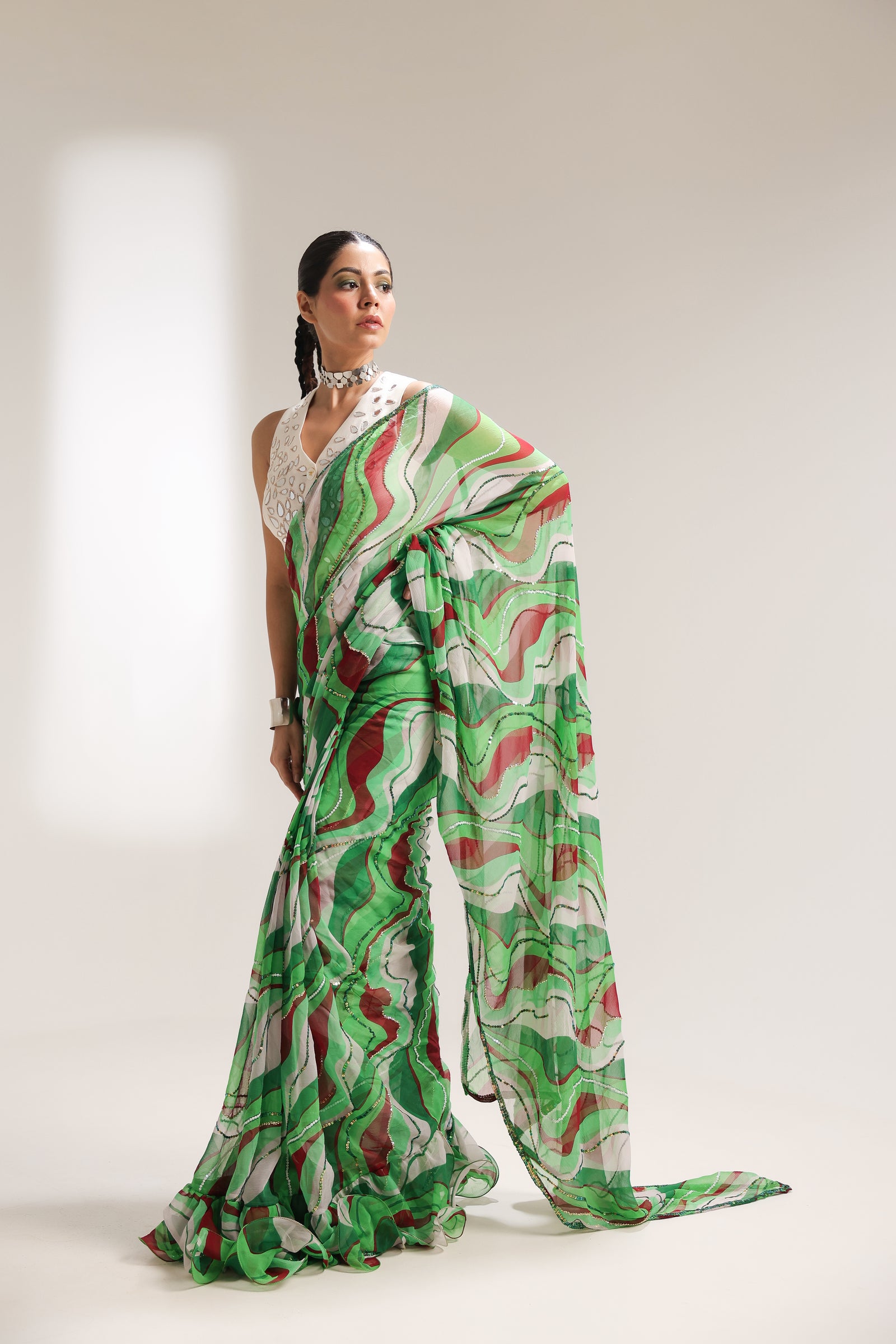 The lush green lehar saree with swagger koti