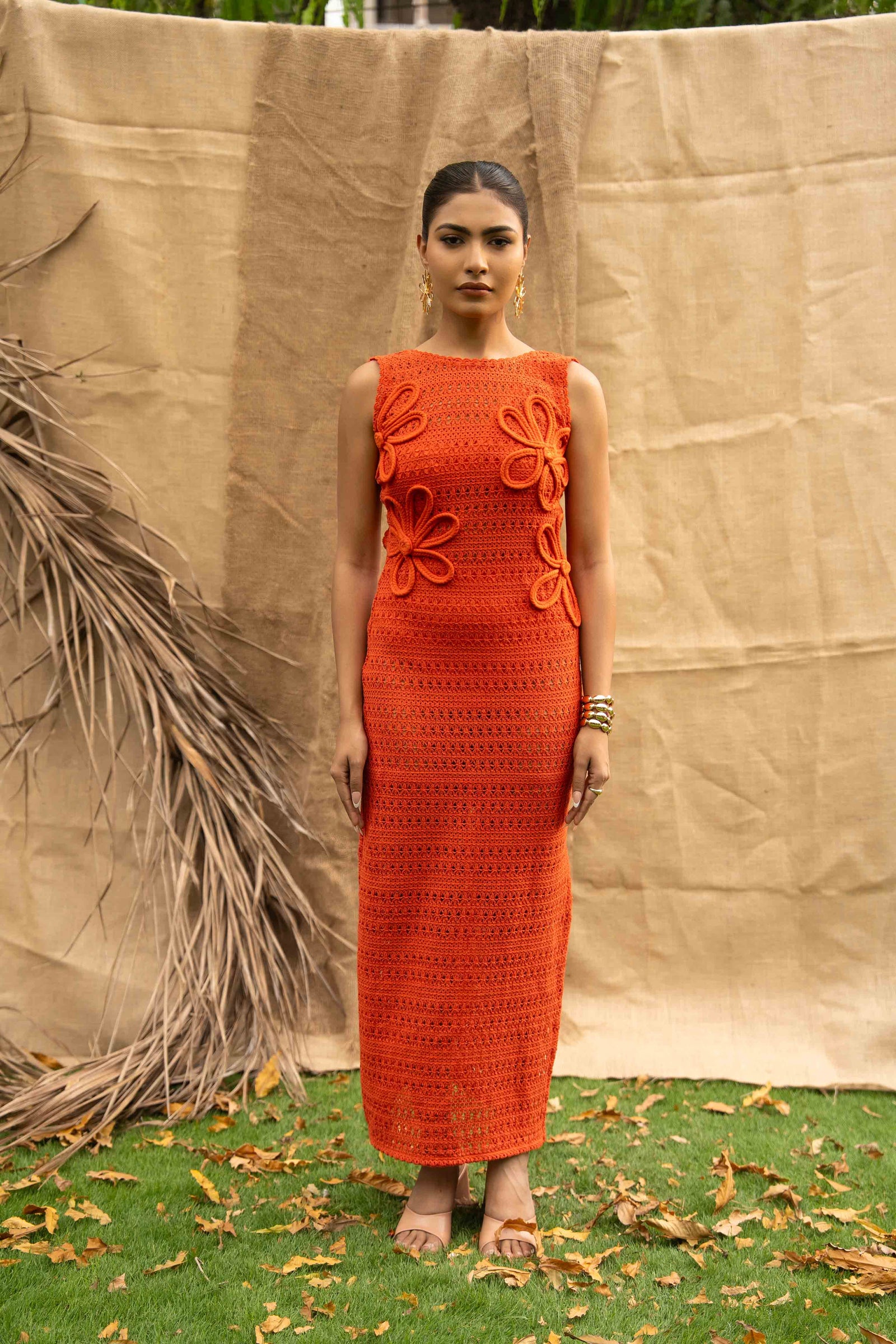 An Orange Knit Dress, Adorned With Hand Embrodiered