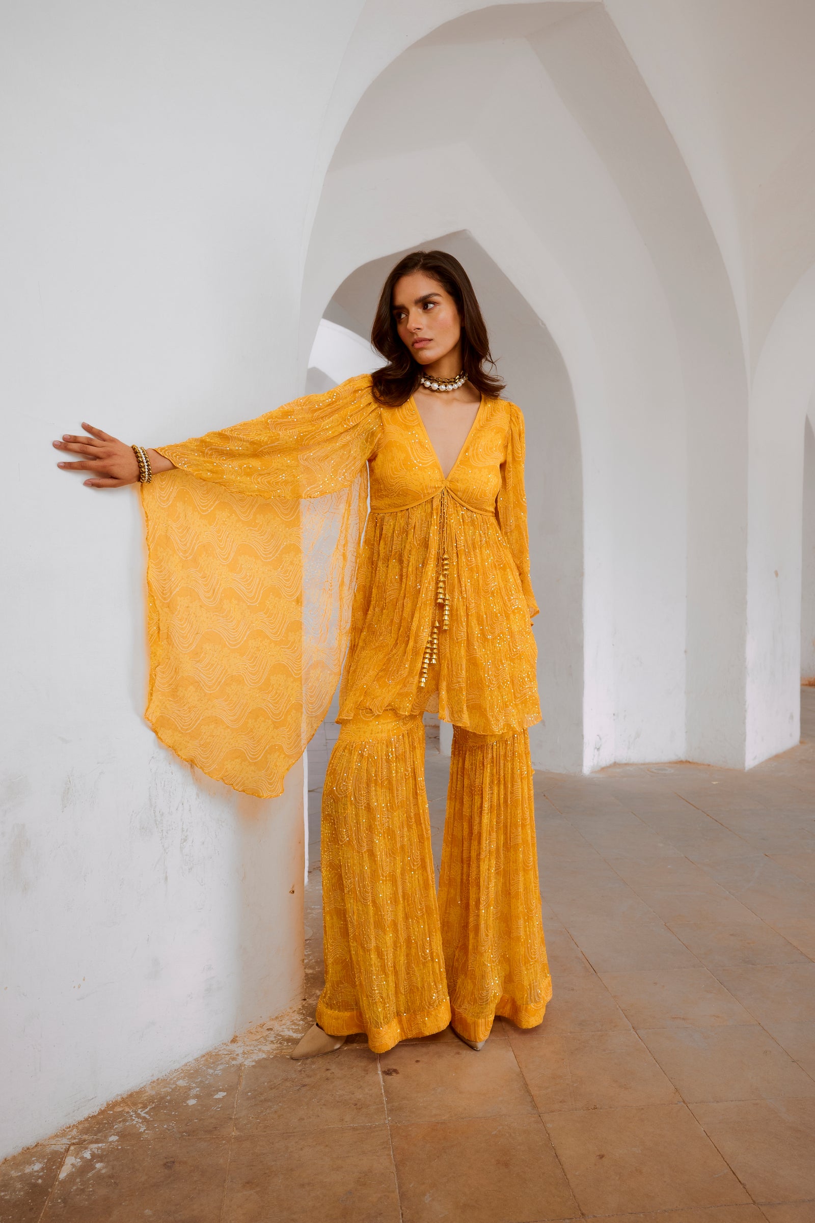 Gulbahar Maigold Yellow the jugnu winged tunic & sharara set