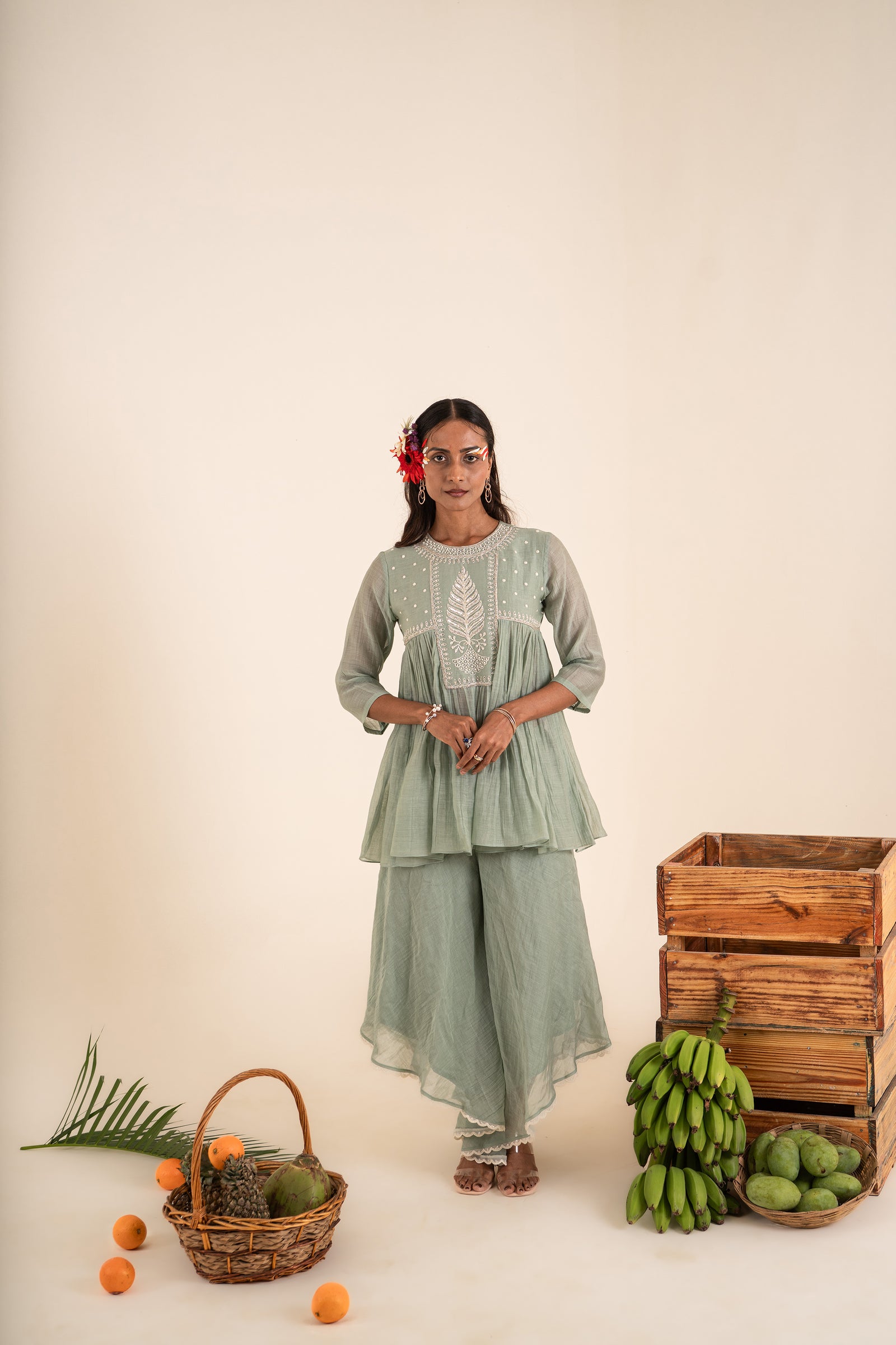 An Ocean Blue Peplum Set Embellished With Hand-Embroidery