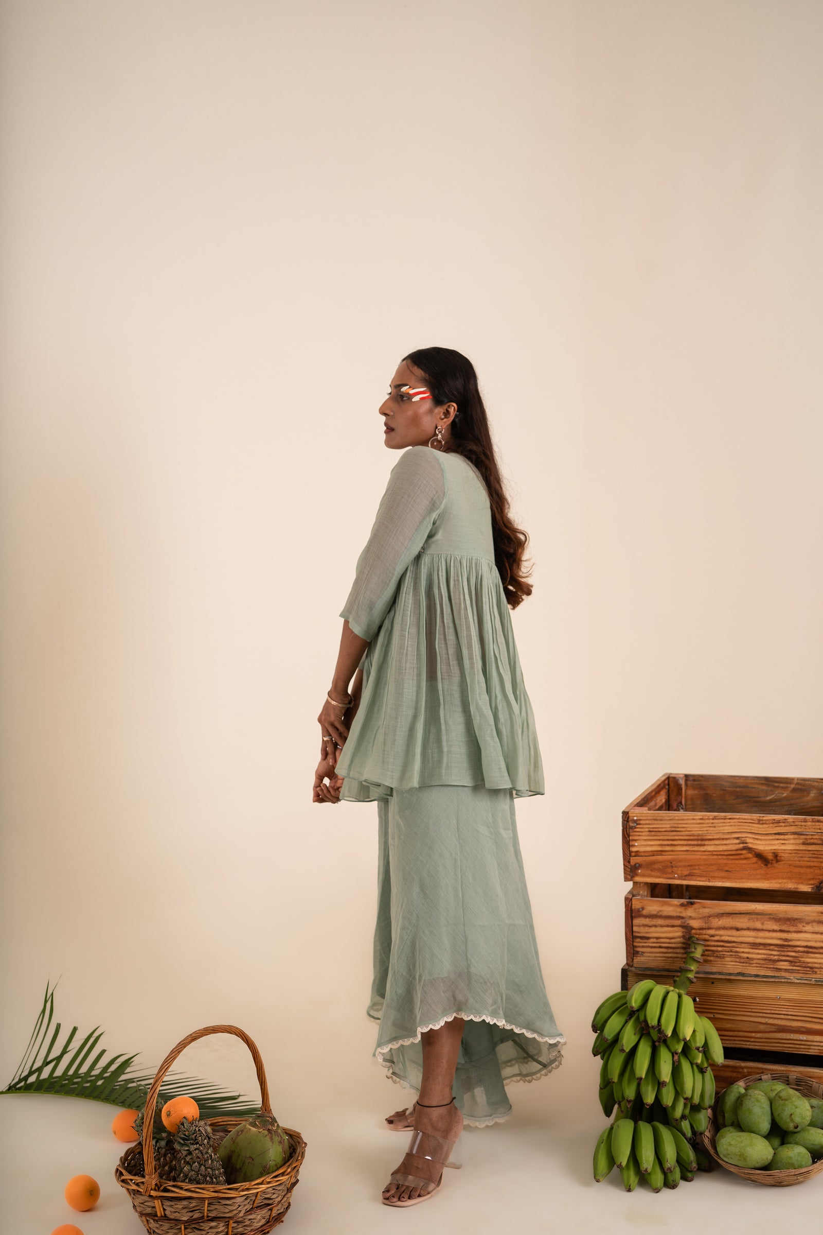 An Ocean Blue Peplum Set Embellished With Hand-Embroidery