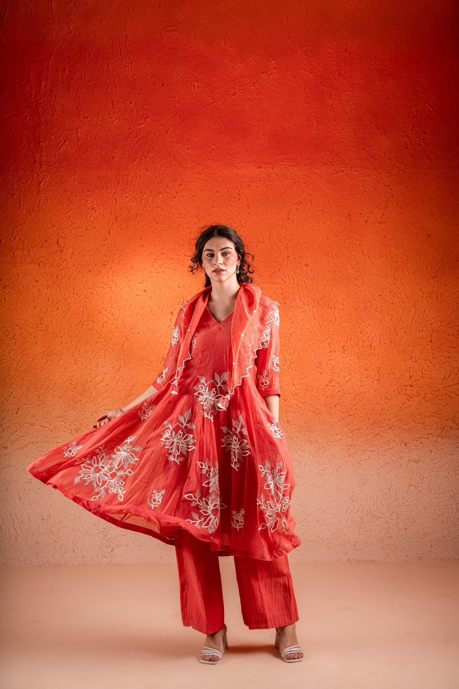 A Georgia Peach Color Anarkali Set