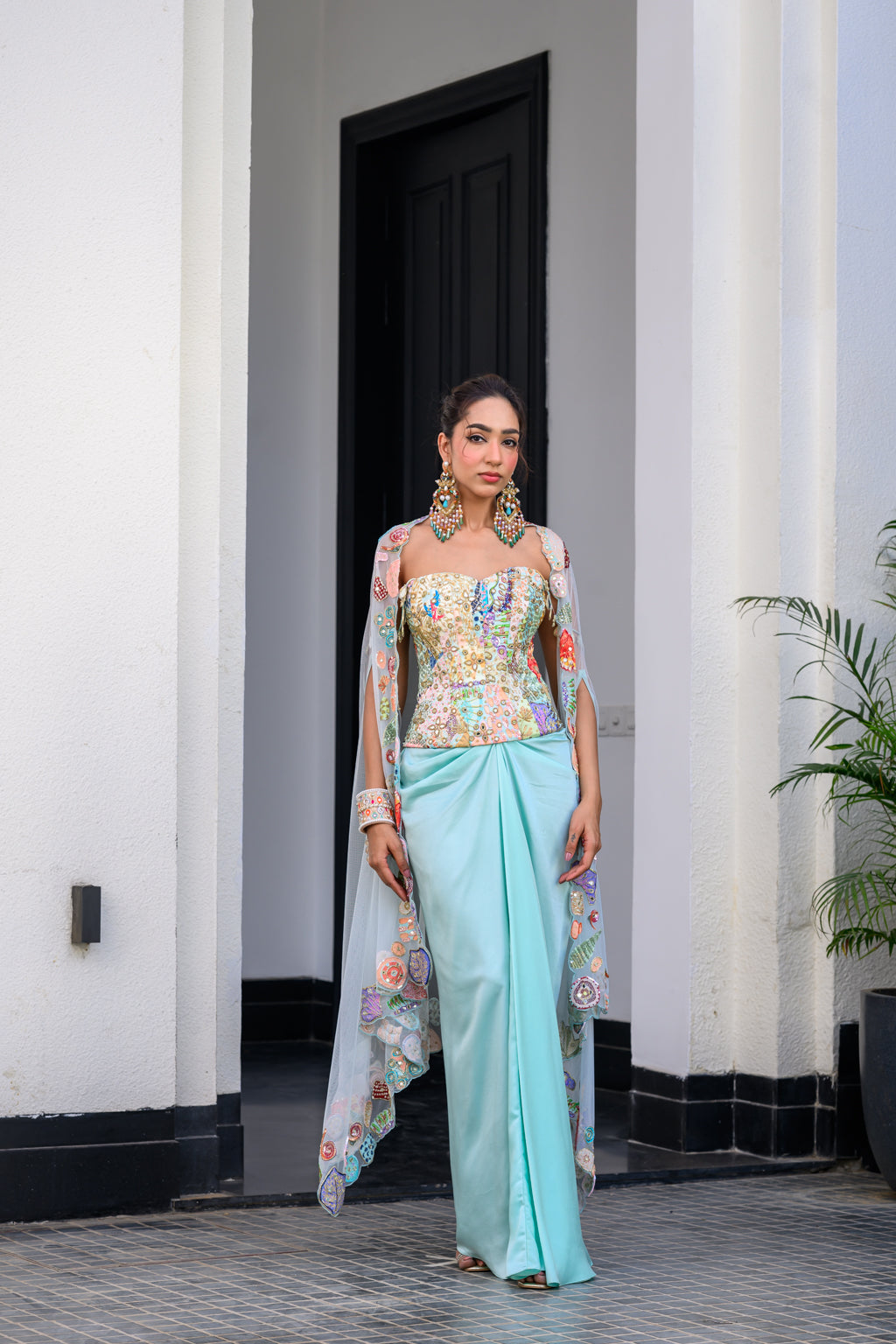Gardenia Highlighted Corset With Dhoti Skirt And Cape