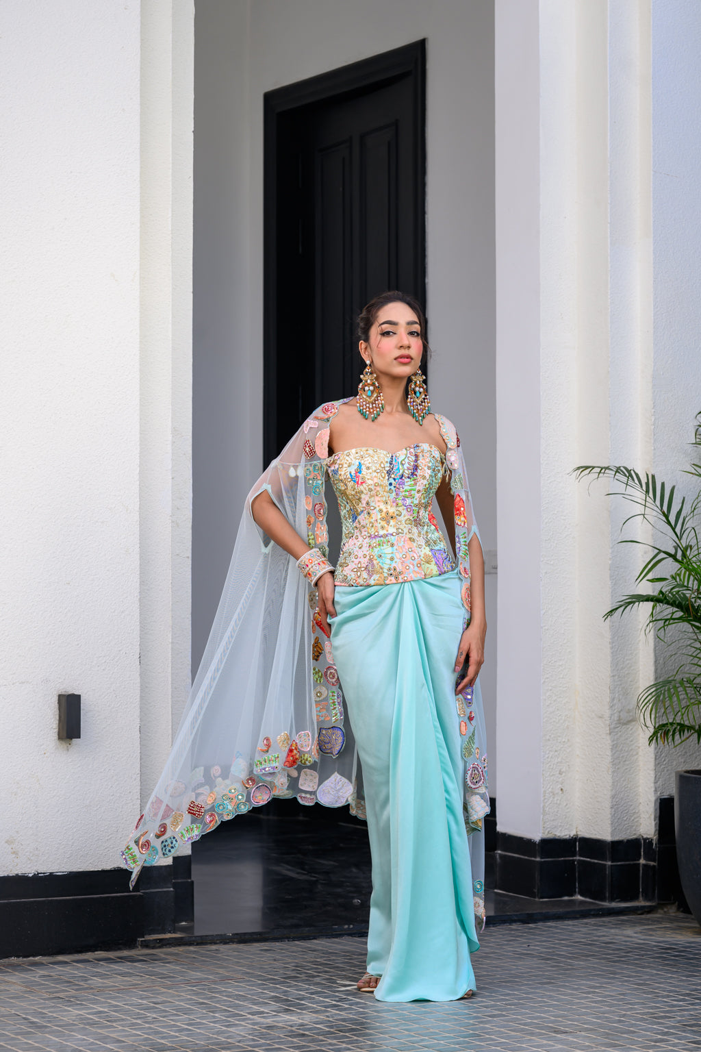 Gardenia Highlighted Corset With Dhoti Skirt And Cape