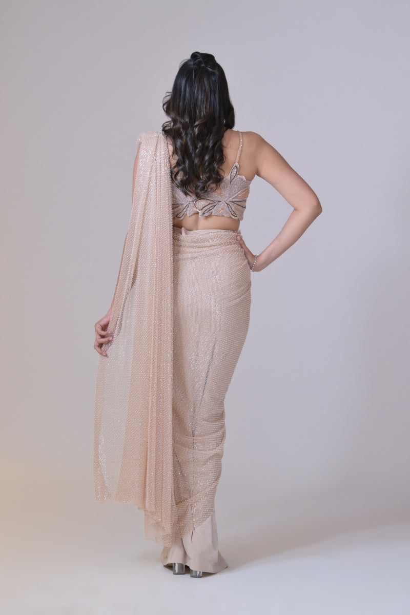 Beige crop top with cutdana palla work and lycra saree drape