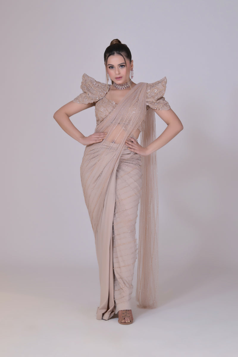 Beige crop top with cutdana palla work and lycra saree drape