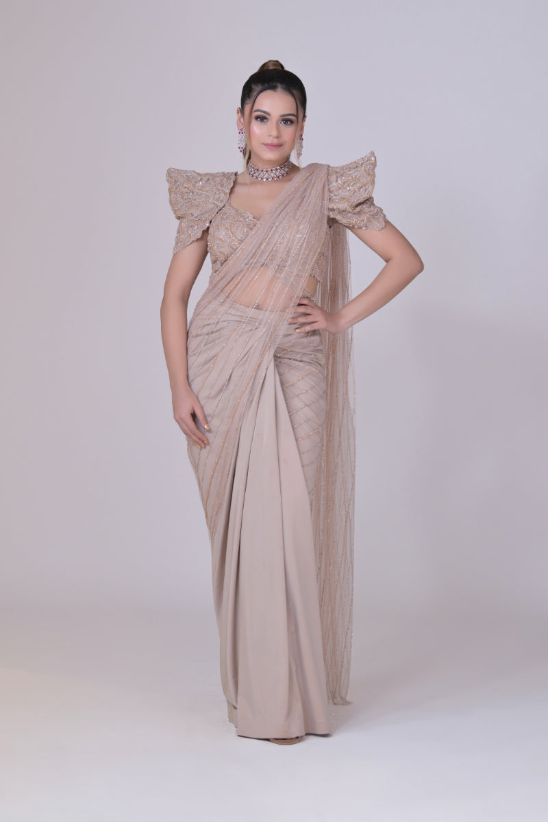Beige crop top with cutdana palla work and lycra saree drape