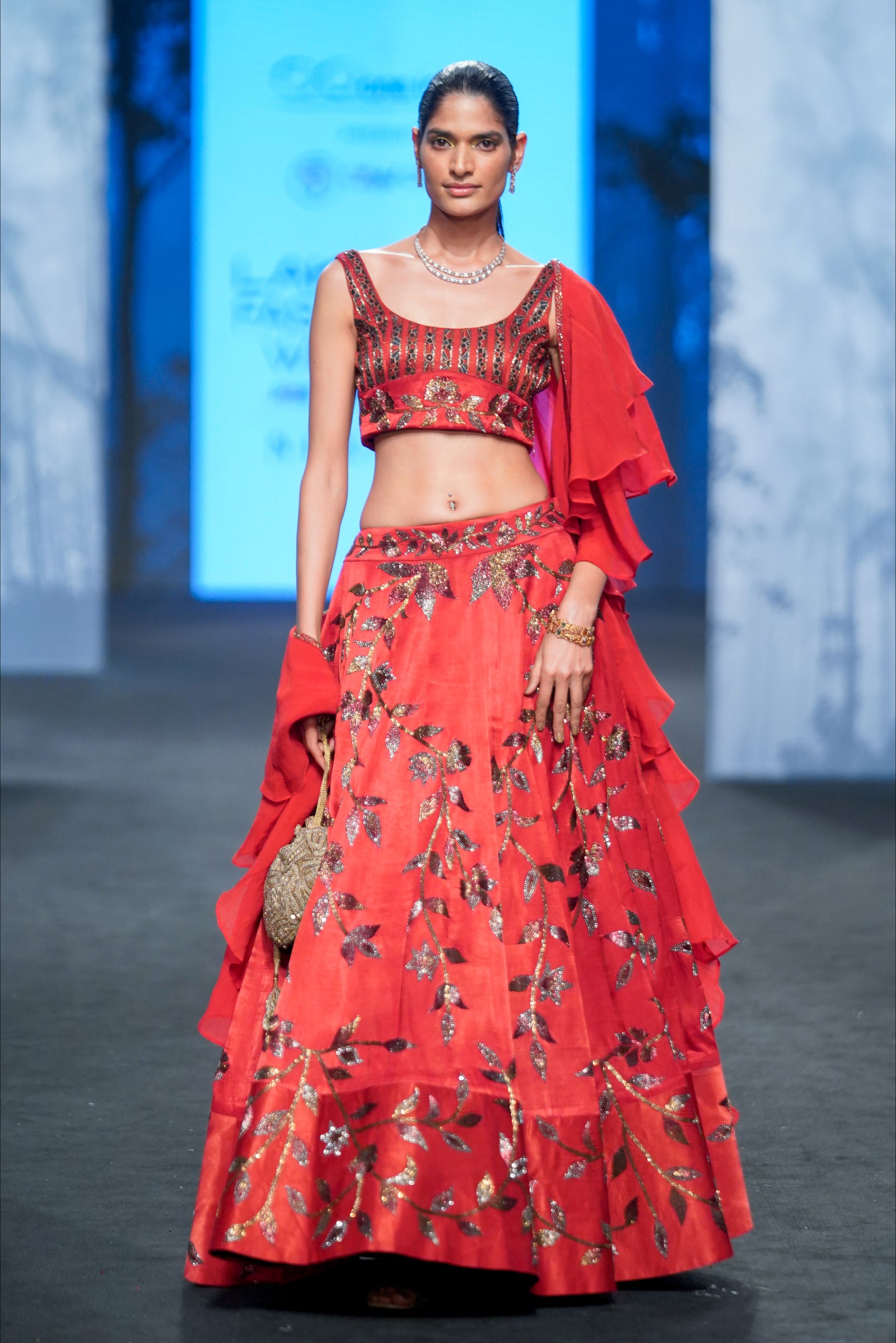 Marrot lehenga with blouse and Ruffle dupatta