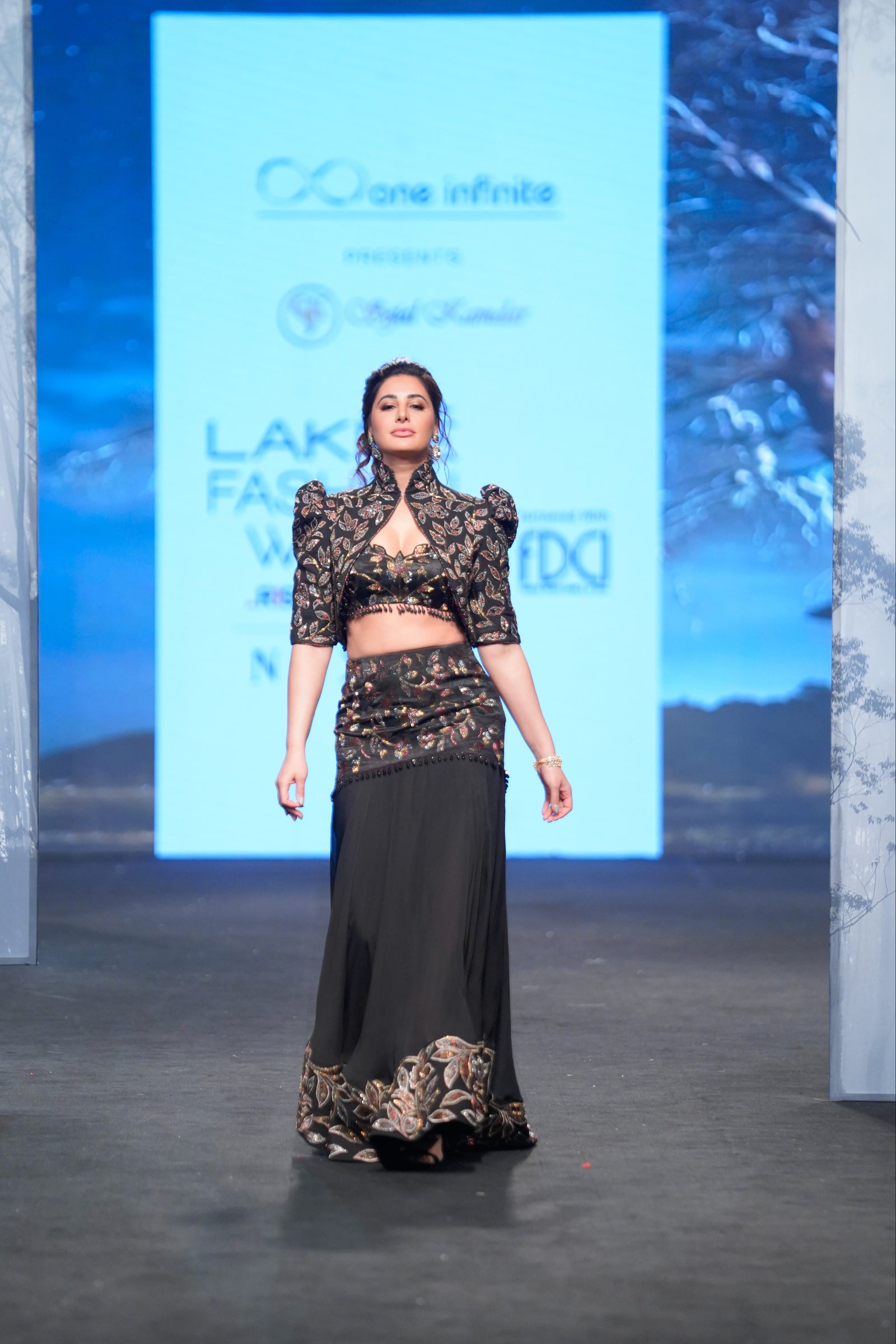 sable black fish tail skirt withblouse and jacket