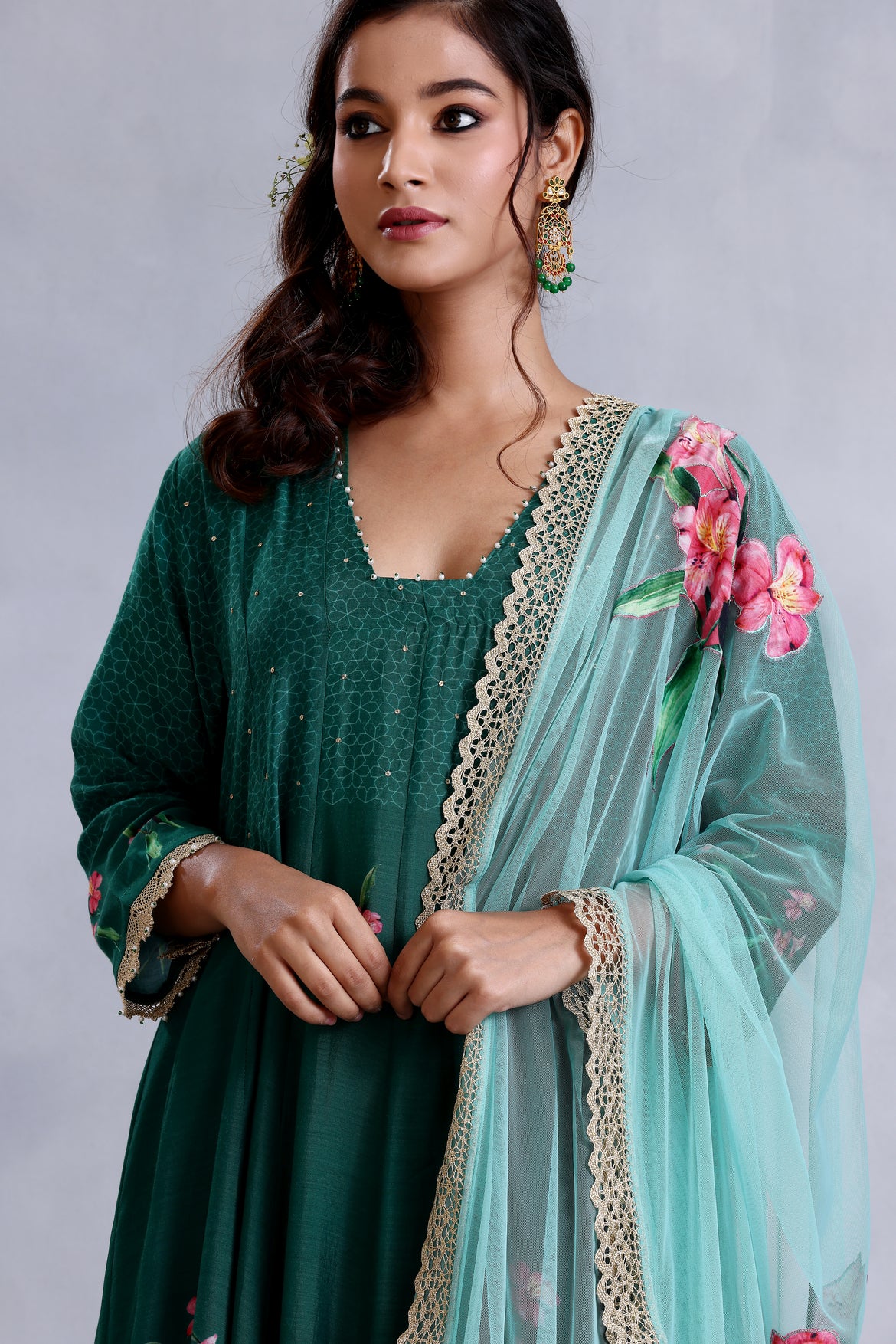 Emerald green kalidar kurta with straight pants and sea green net dupatta