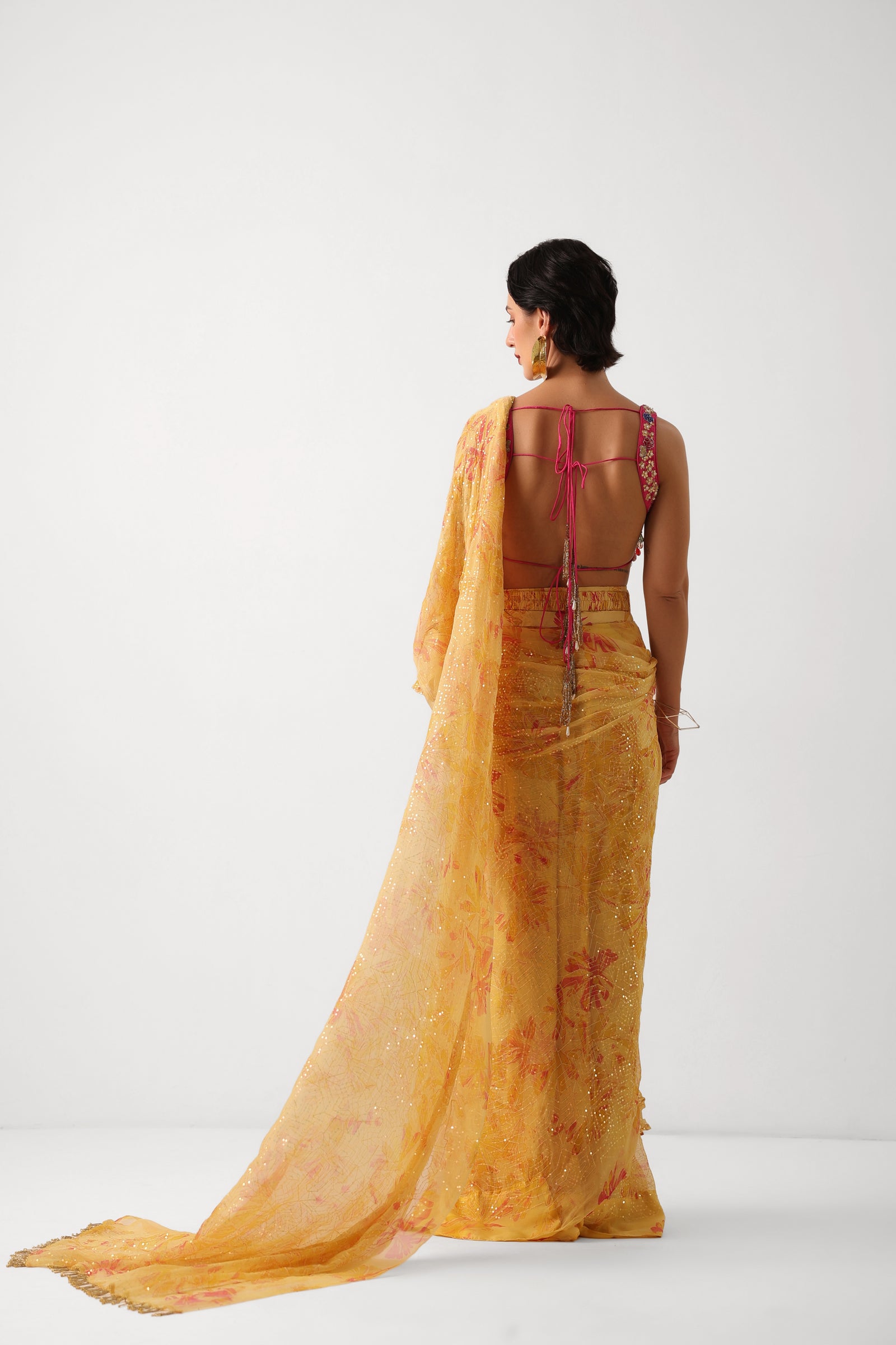 The alipore jhilmil saree set in butter yellow with phool gota blouse