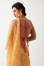 The alipore jhilmil saree set in butter yellow with phool gota blouse