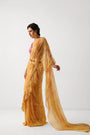 The alipore jhilmil saree set in butter yellow with phool gota blouse