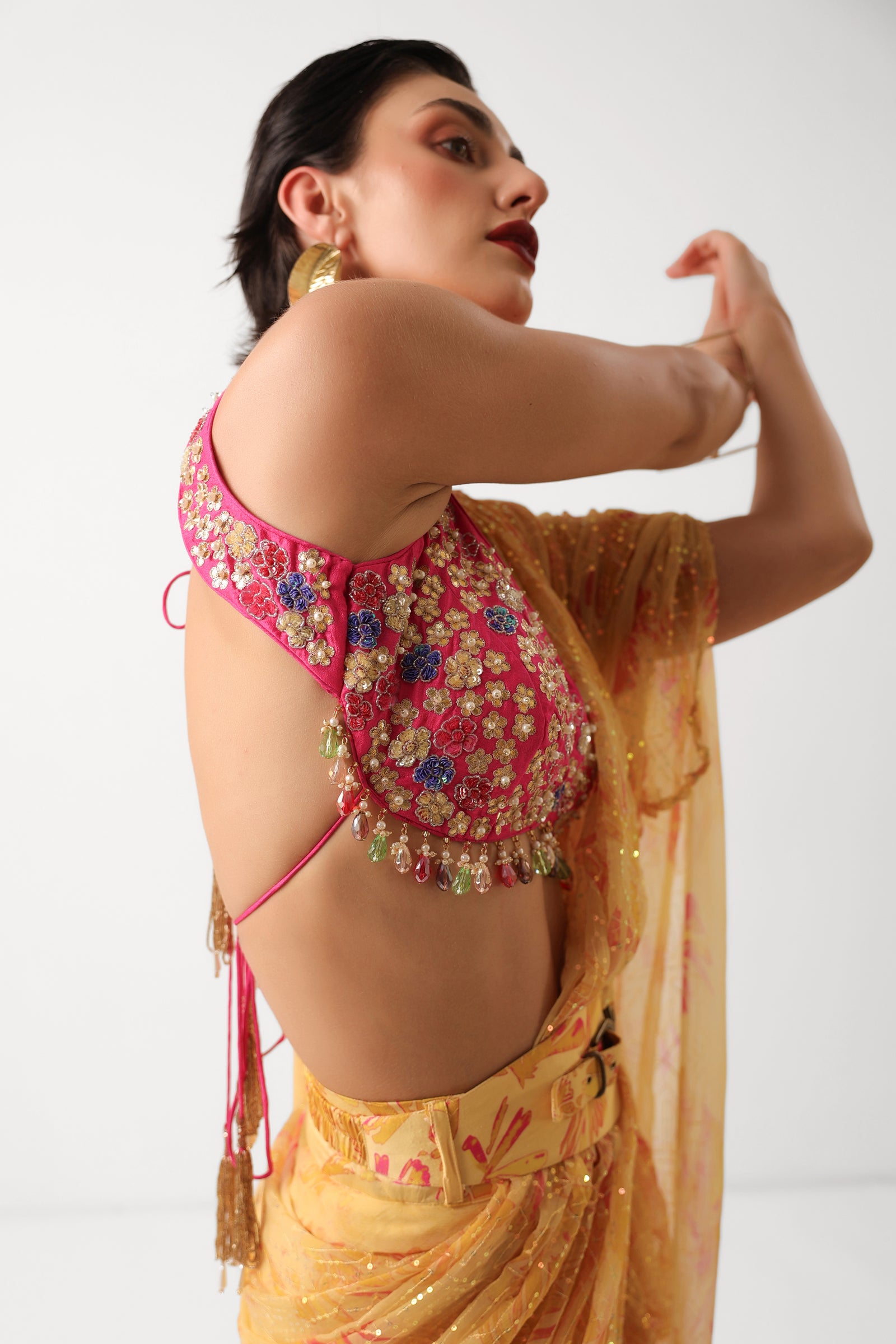 The alipore jhilmil saree set in butter yellow with phool gota blouse