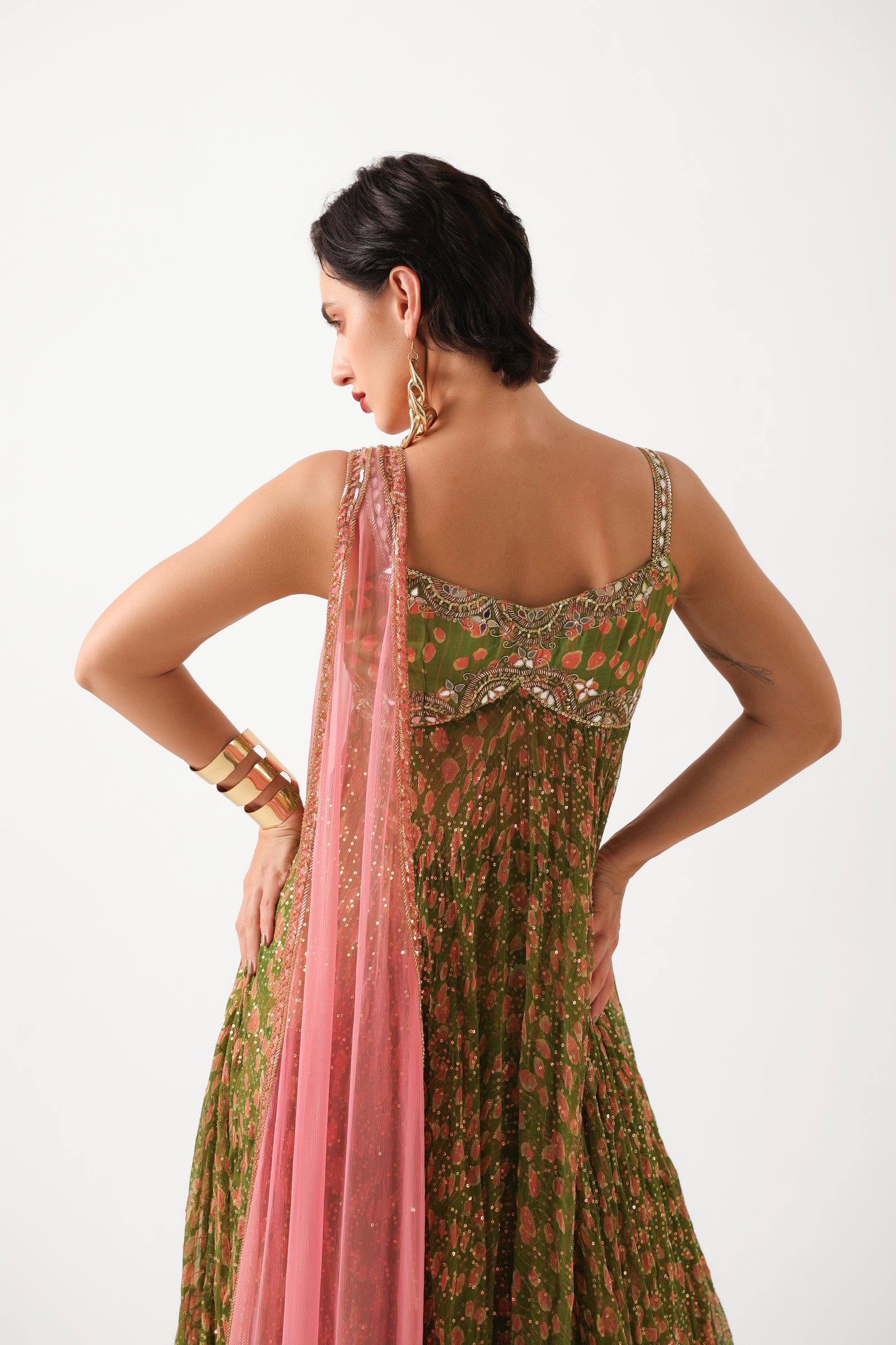 The Calcutta Mehendi set in avacado green with gulabi dupatta