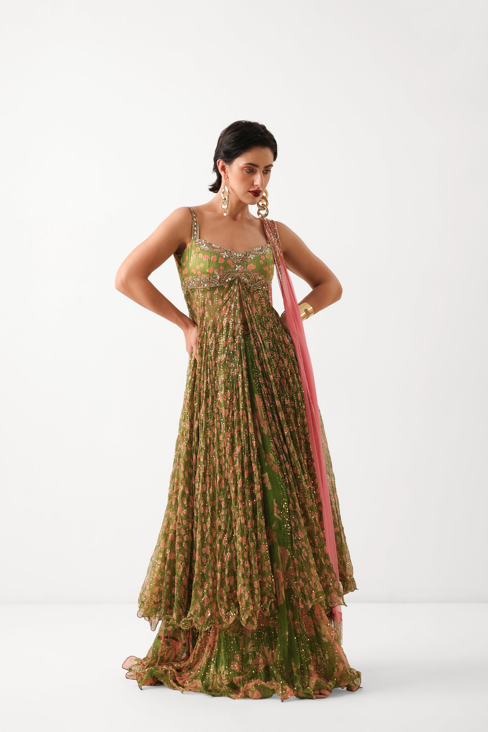 The Calcutta Mehendi set in avacado green with gulabi dupatta