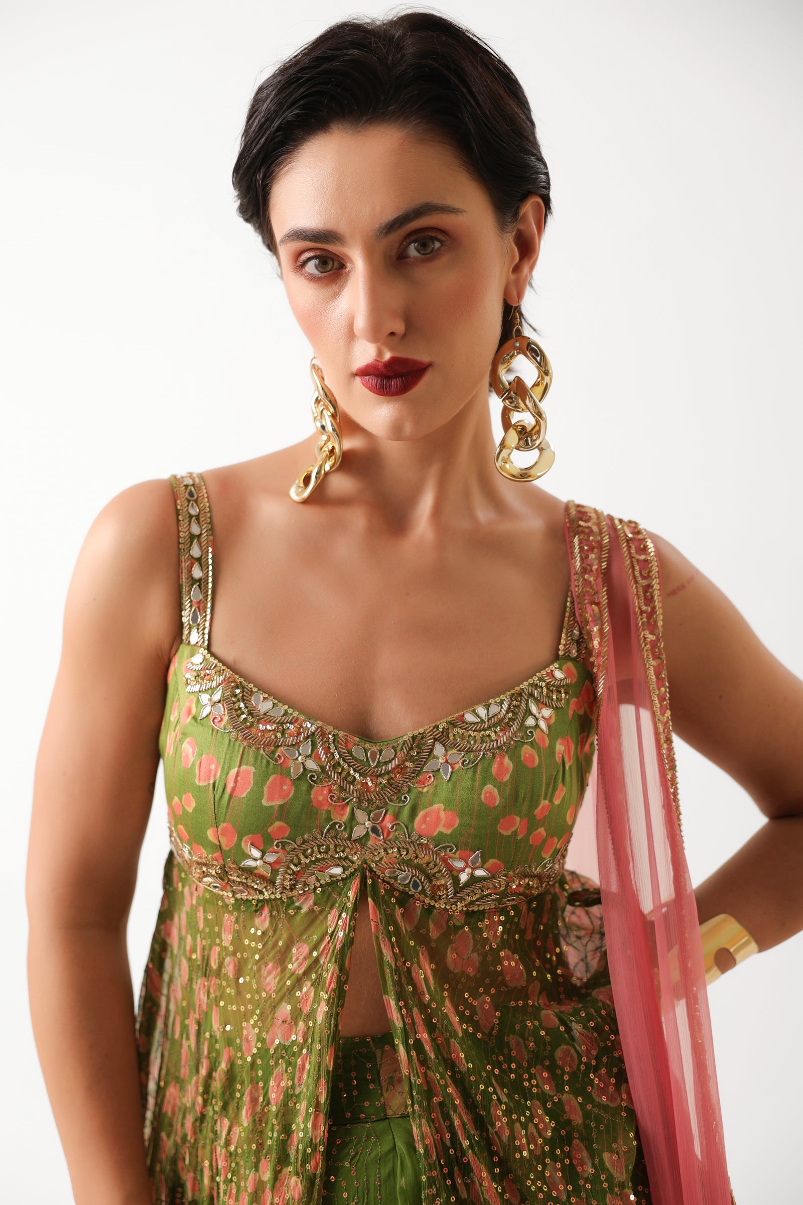 The Calcutta Mehendi set in avacado green with gulabi dupatta