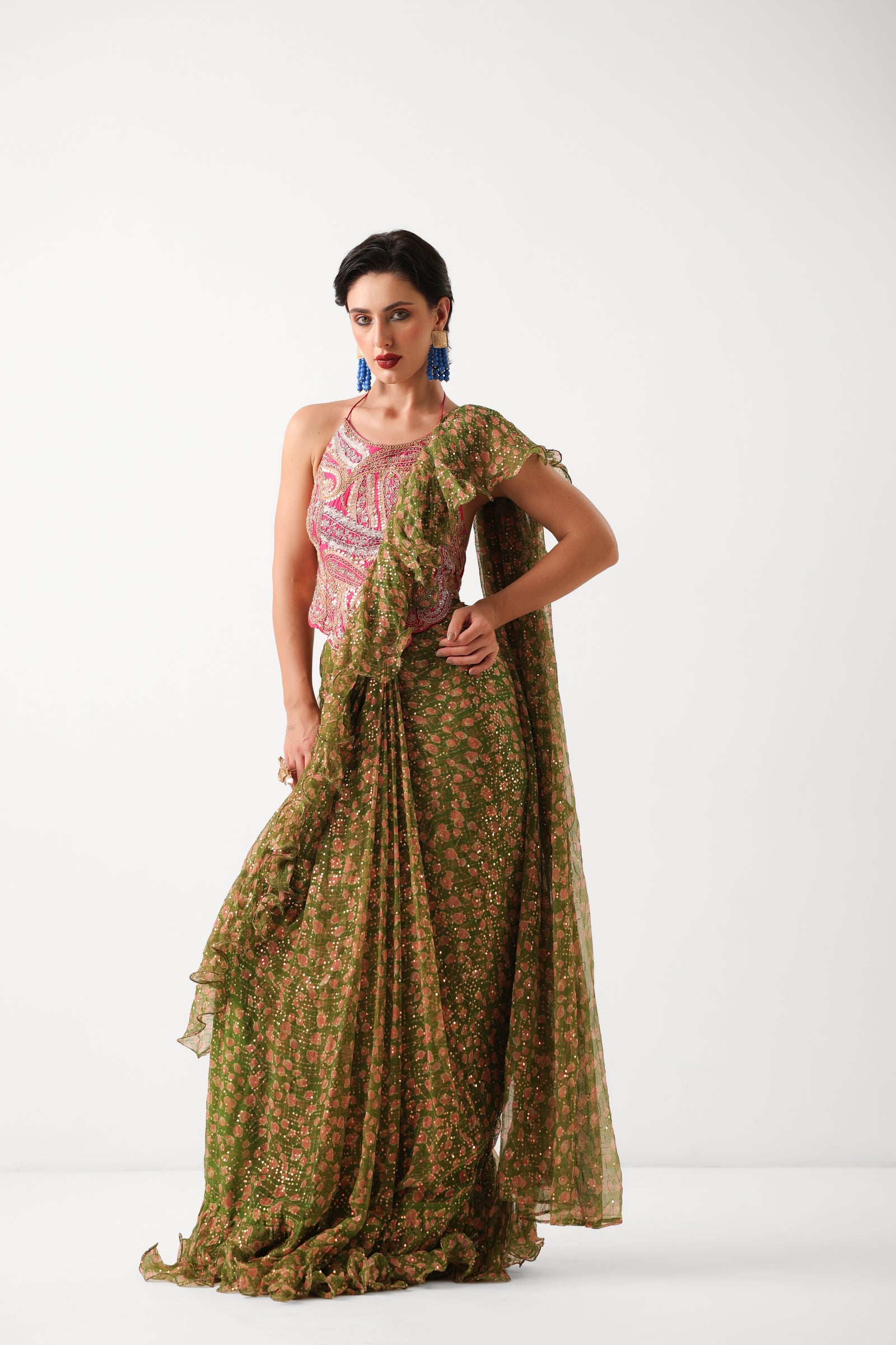 The Ezra Jhilmil saree set in avacado green with rani ambi blouse