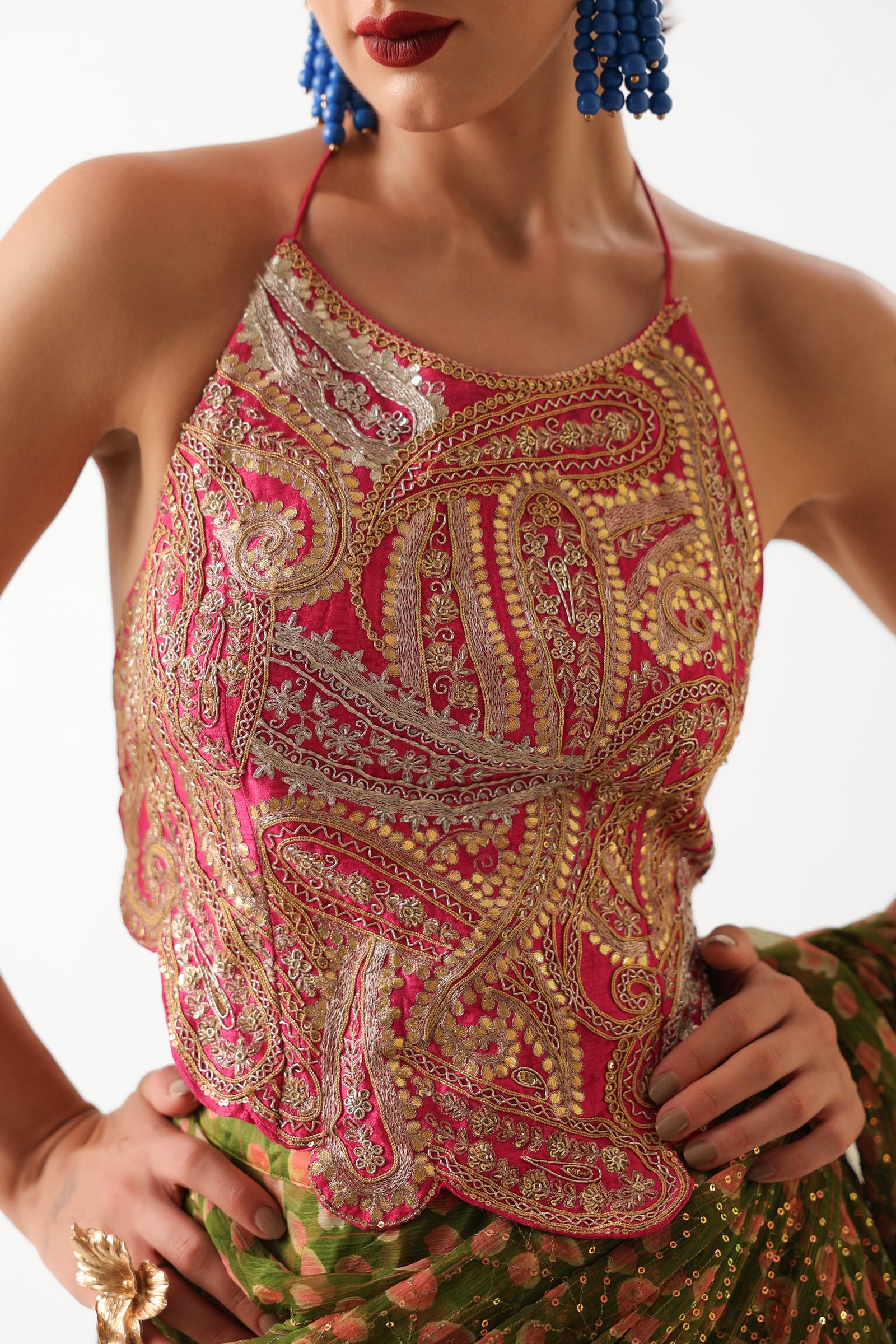 The Ezra Jhilmil saree set in avacado green with rani ambi blouse