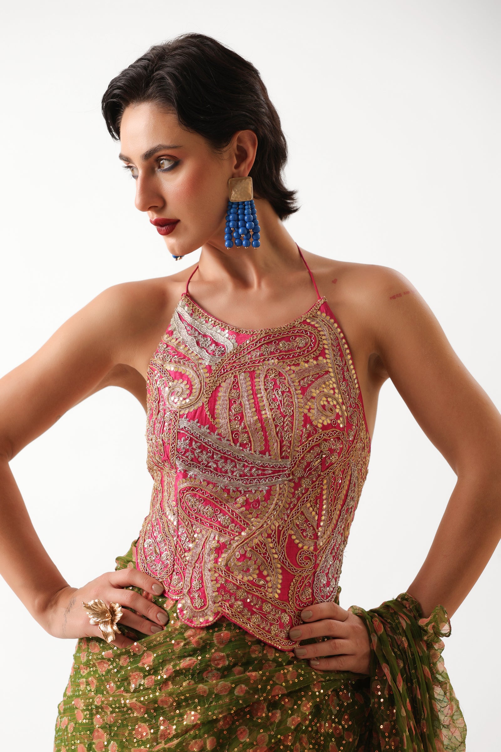 The Ezra Jhilmil saree set in avacado green with rani ambi blouse