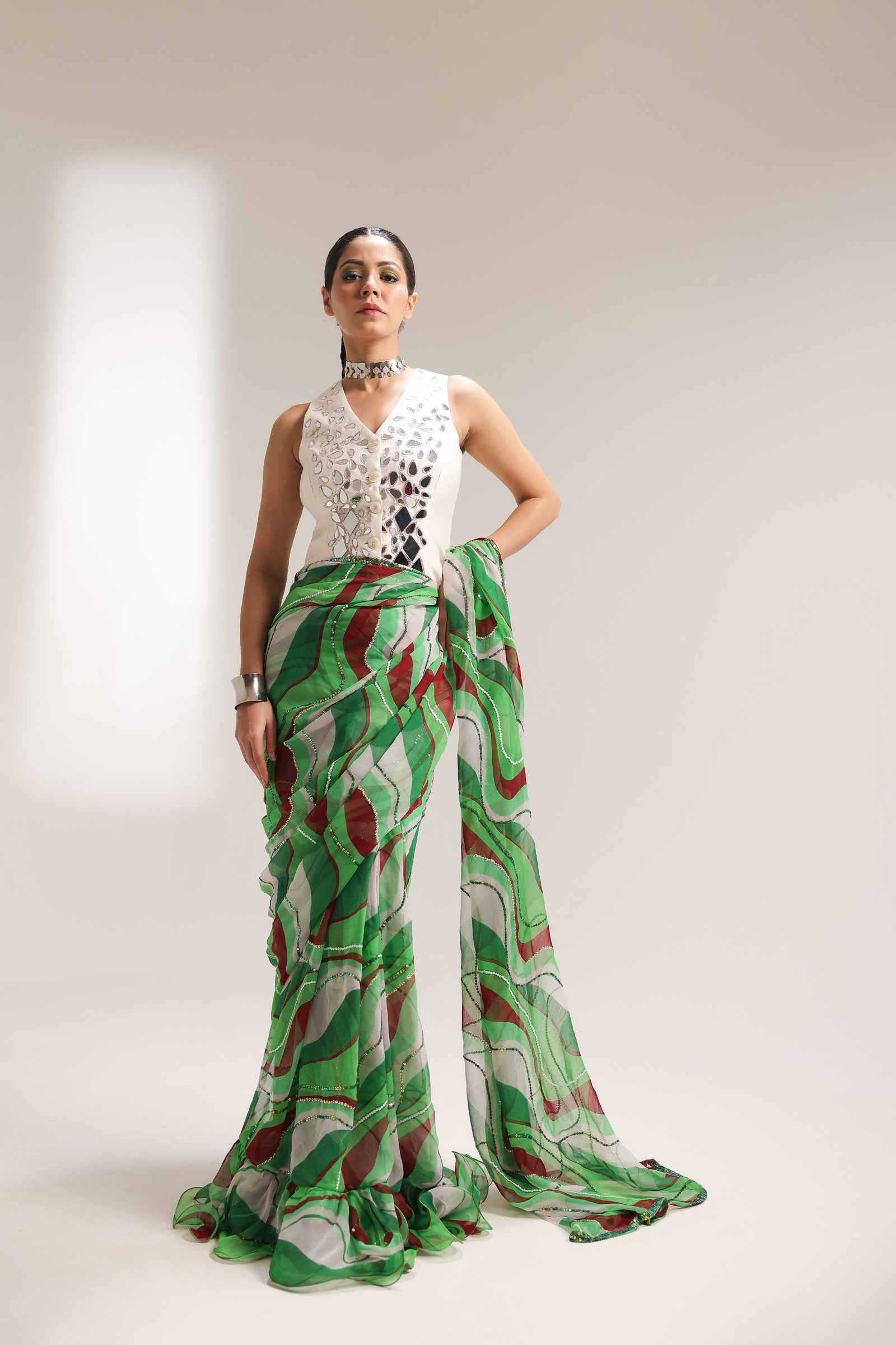 The lush green lehar saree with swagger koti