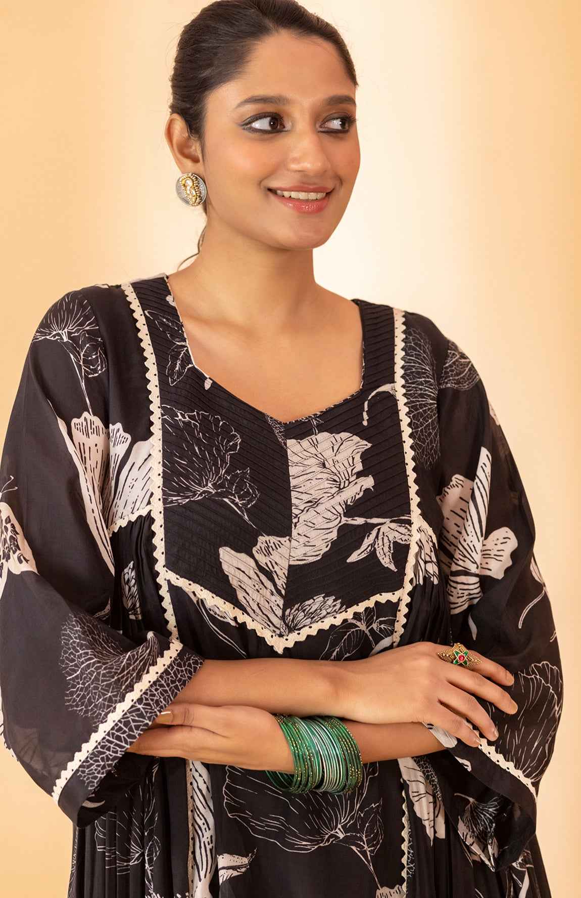 A Kurta Set Paired With Straight Pants And A Scarf