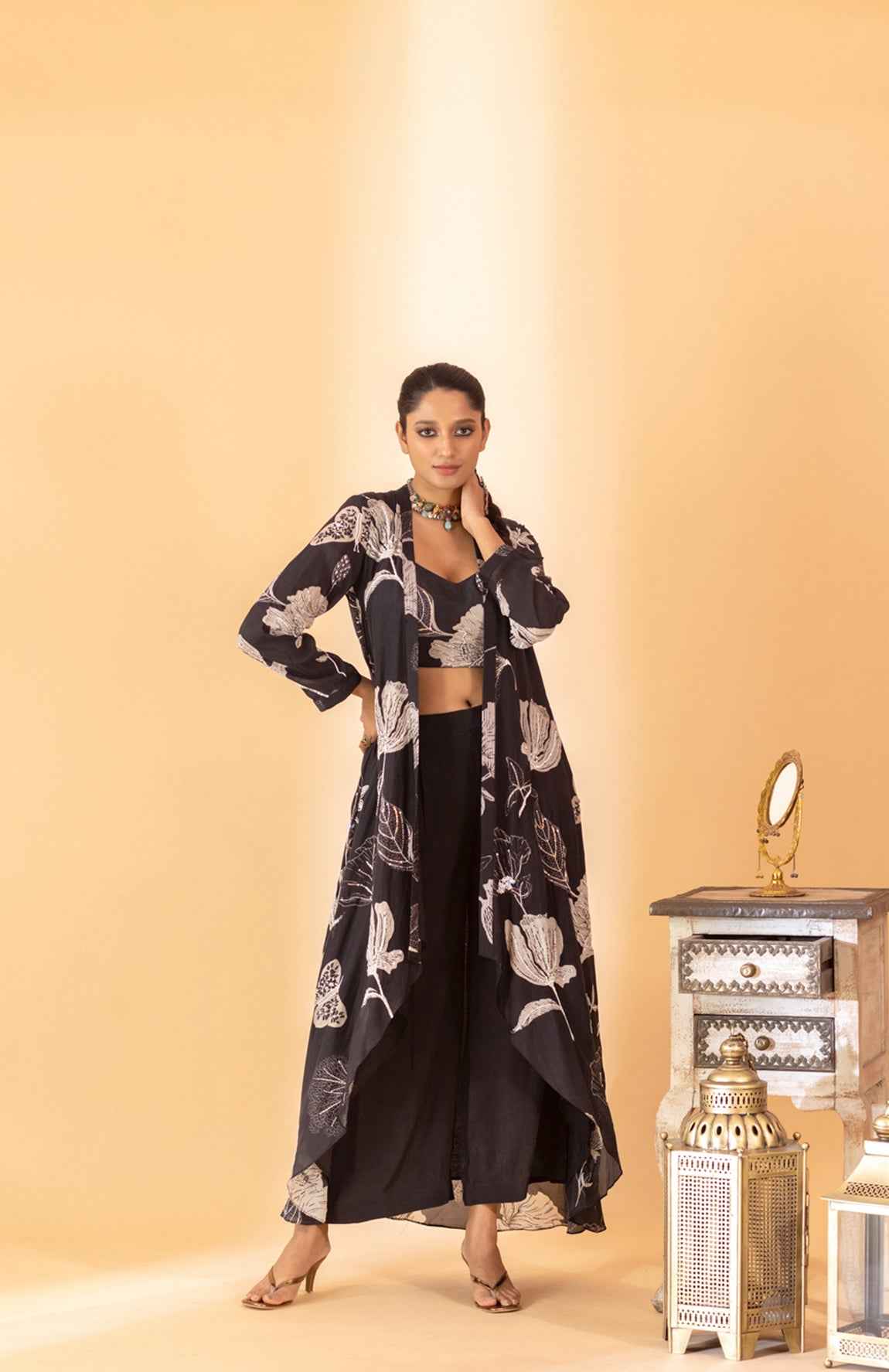 A Floral Printed Jacket Set Paired With Bustier And Pants