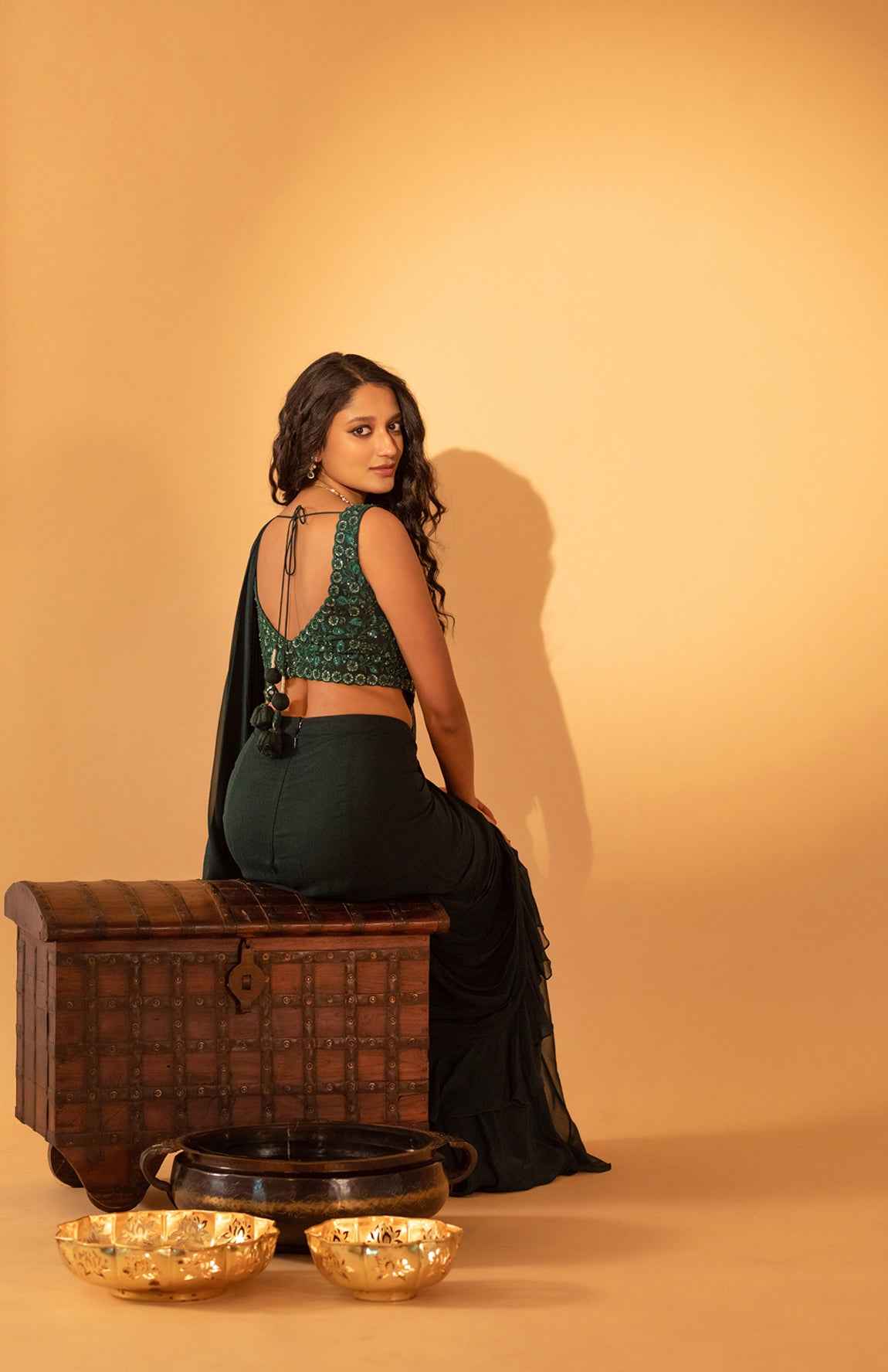 A Bottle Green Saree Set Paired With Embroidered Blouse