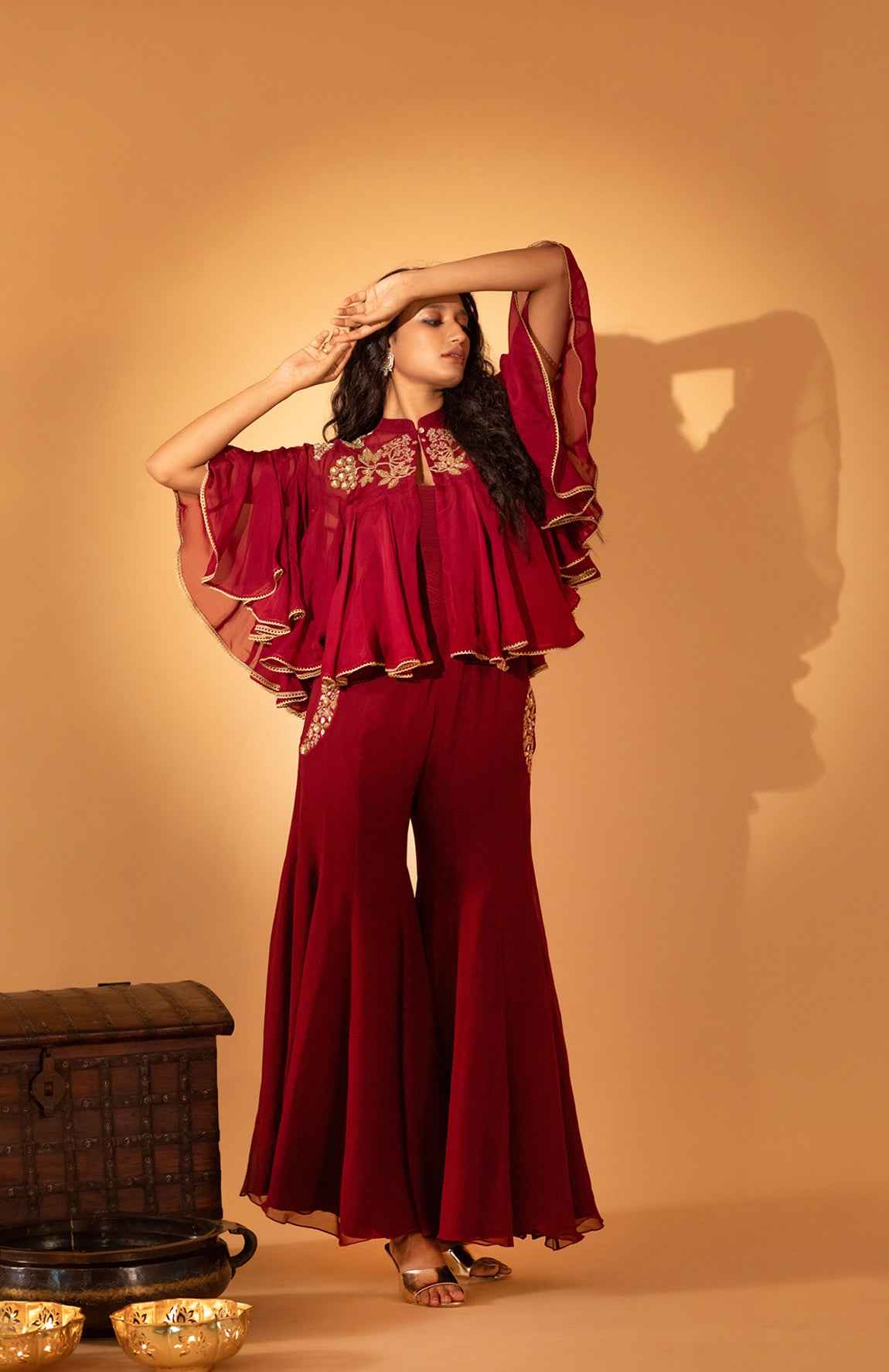A Jumpsuit With Embroidered Cape