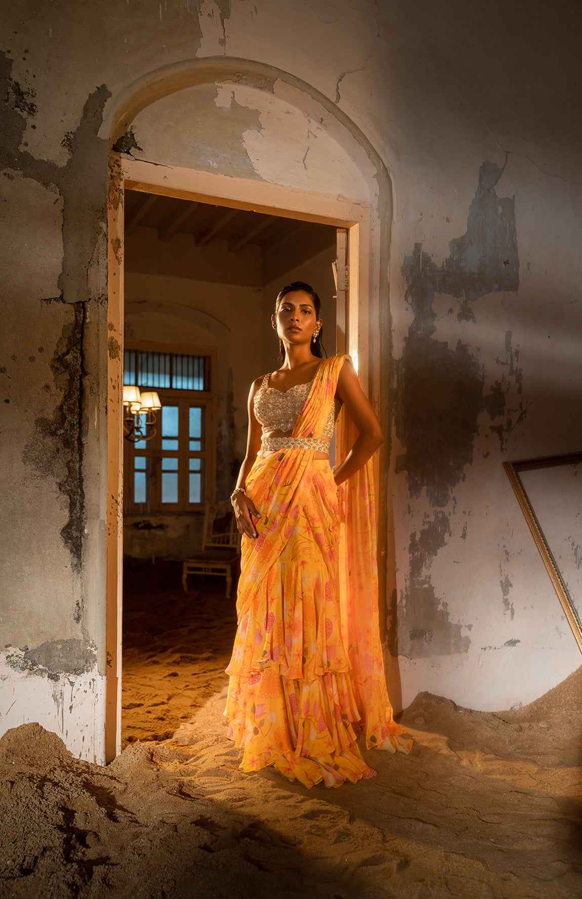 A Pre-Draped Layer Saree With Hand Embroidered Blouse And Belt