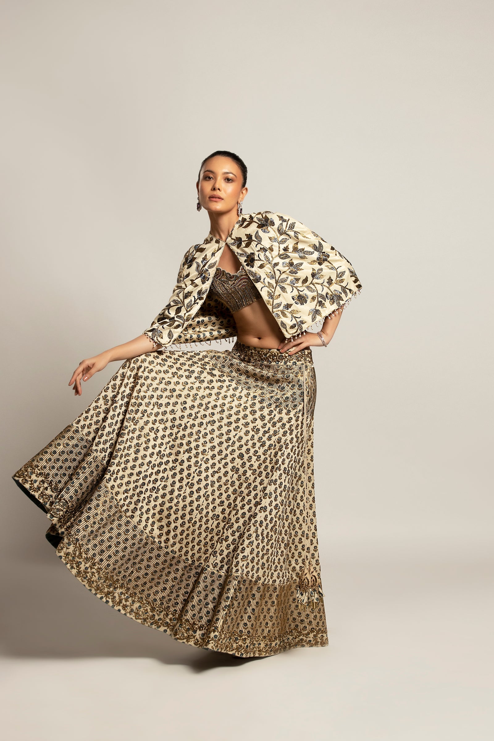 Lissome faded ivory blouse & Cape with Comely lehenga