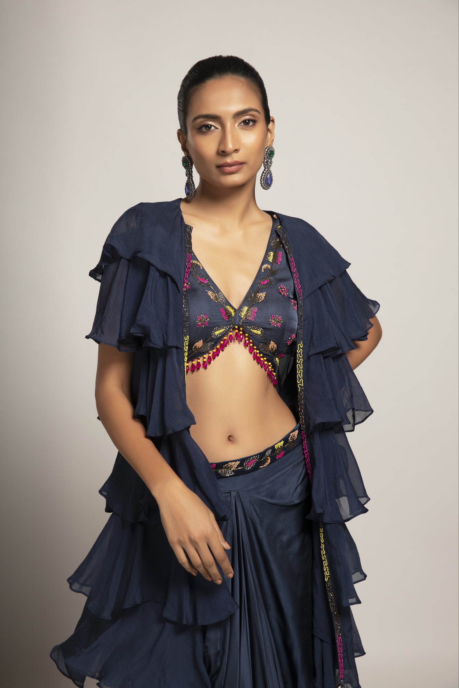 Ravishing Navy blue blouse and drape skirt with fine layered organza jacket