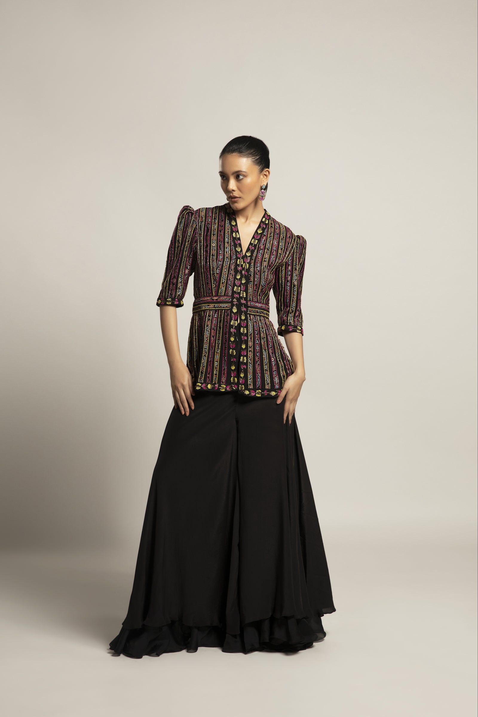 Delectable peplum top with black flare pants
