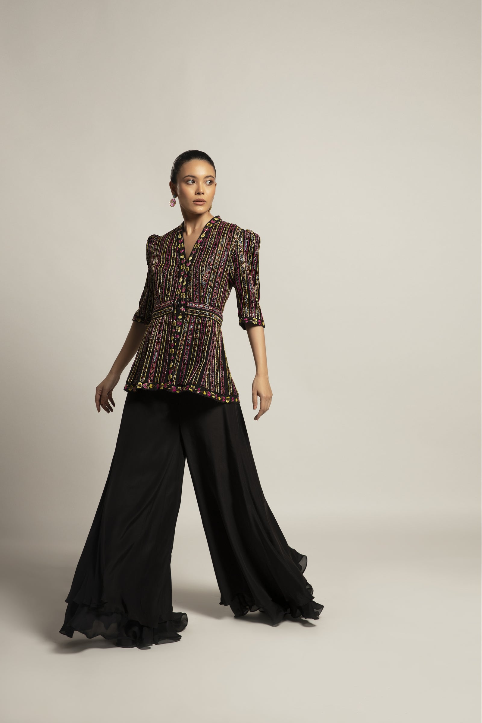 Delectable peplum top with black flare pants