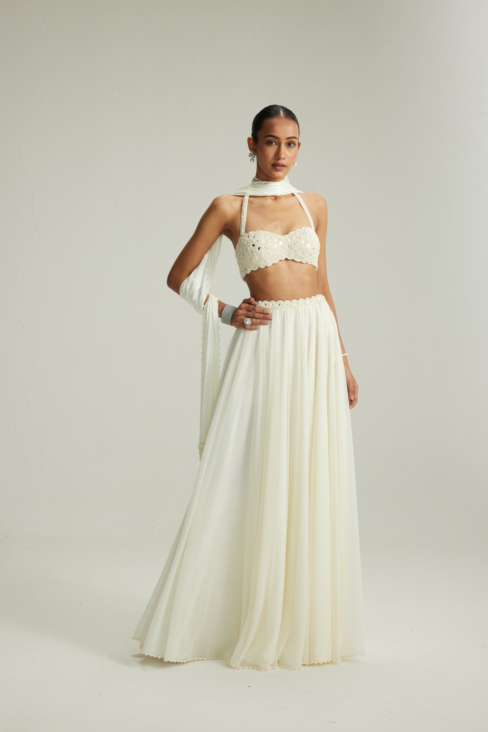 Off White Skirt Set With Halter Neck Blouse