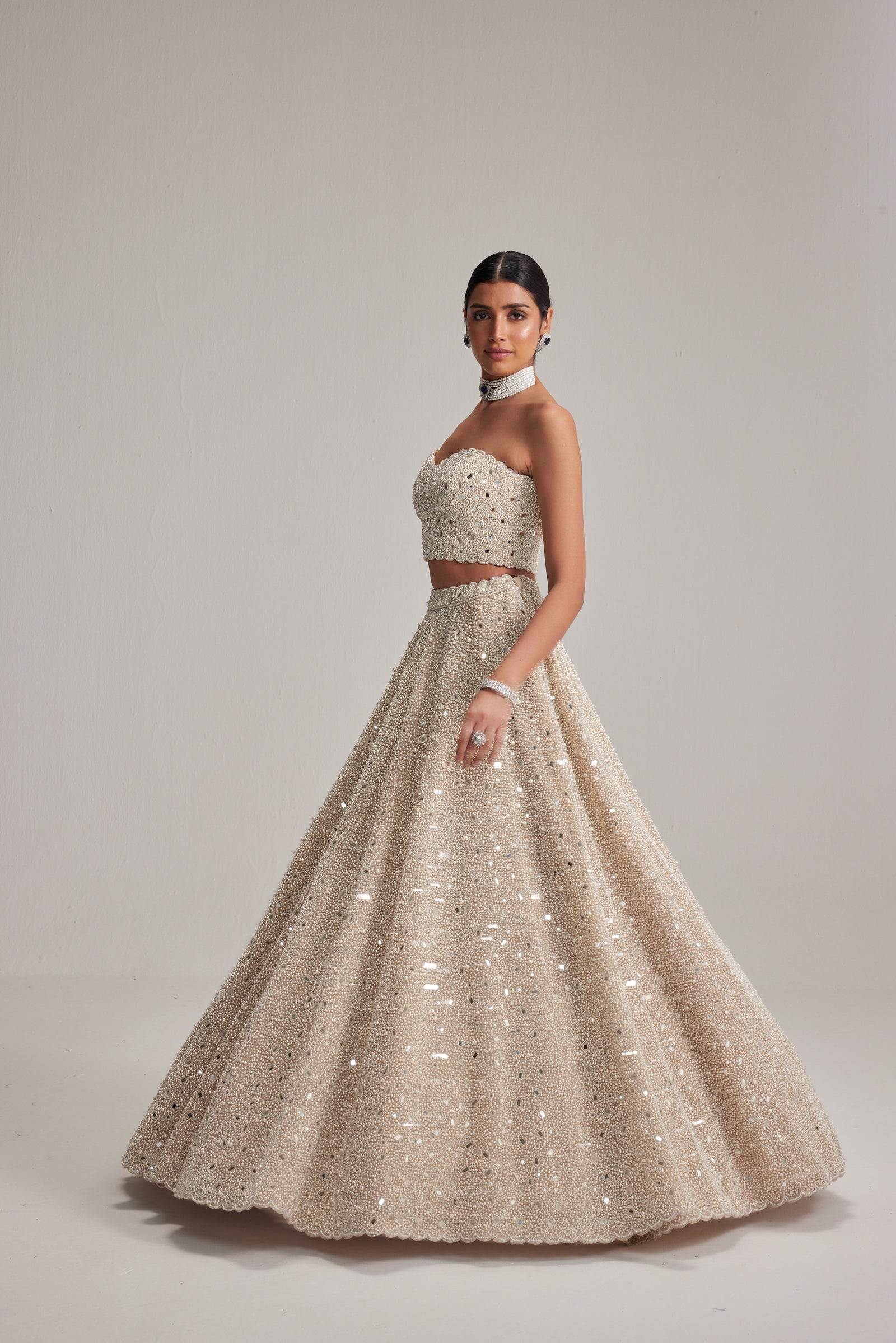 Light Beige Dense mirror and pearl Corset lehenga set