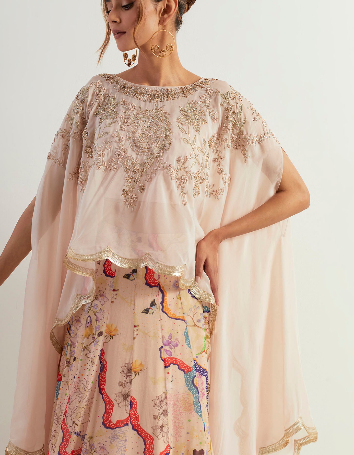 Organza hand embroidered dupatta cape with inner paired with eclectic printed skirt