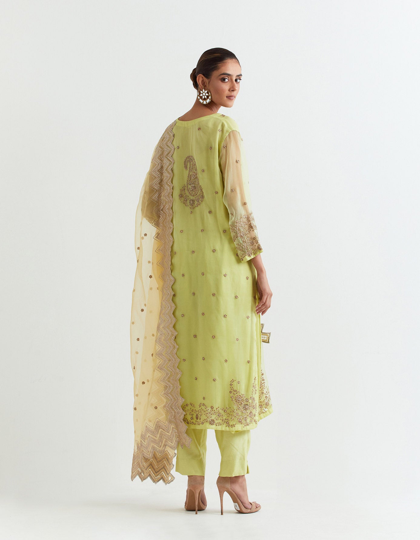 Lime organza silk kurta in zardozi embroidery paired with chanderi silk pants and lemon chevron embroidered dupatta