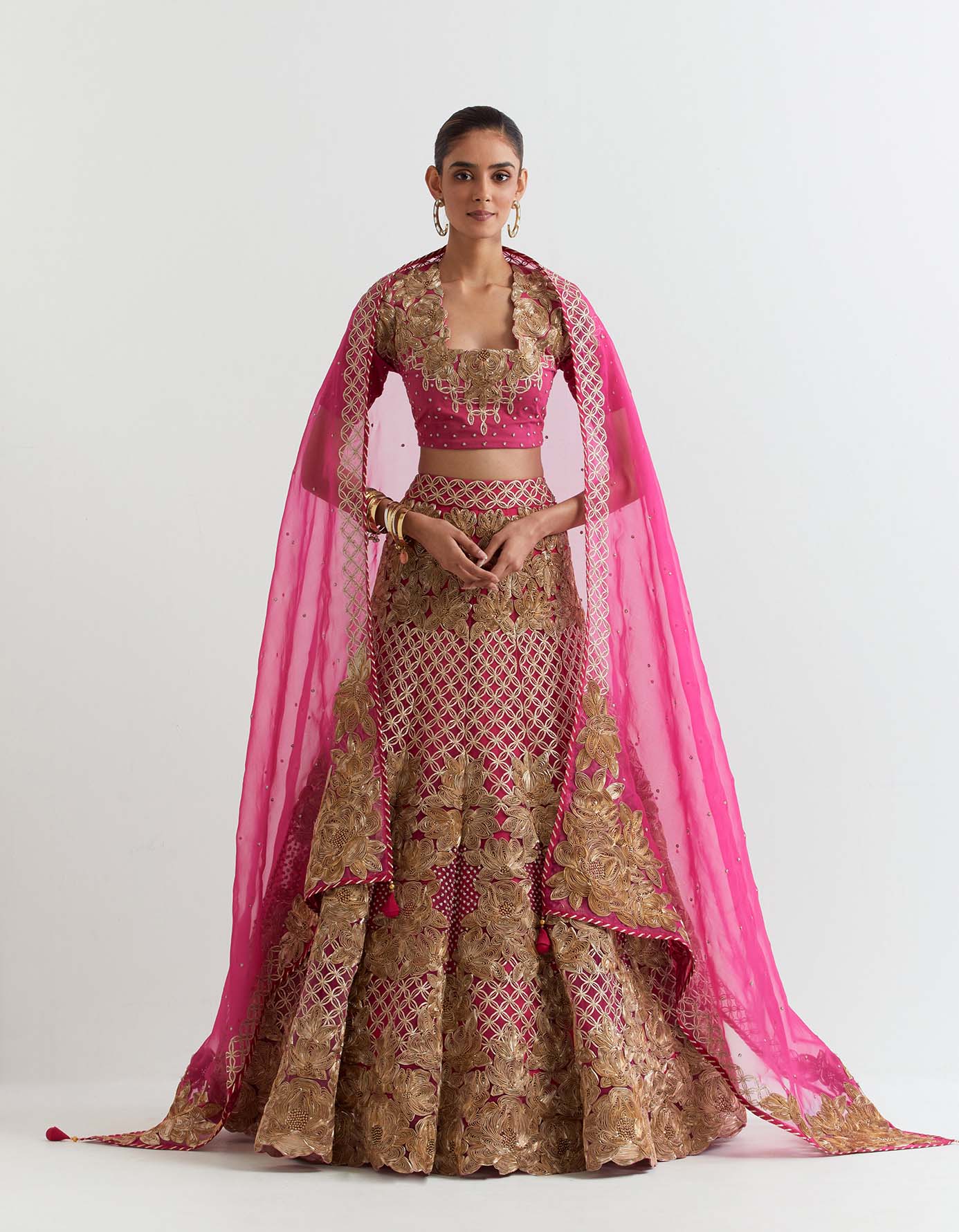 Fuchsia all over embroidered skirt in exquisite gota embroidery paired with organza silk dupatta and stretch lycra blouse