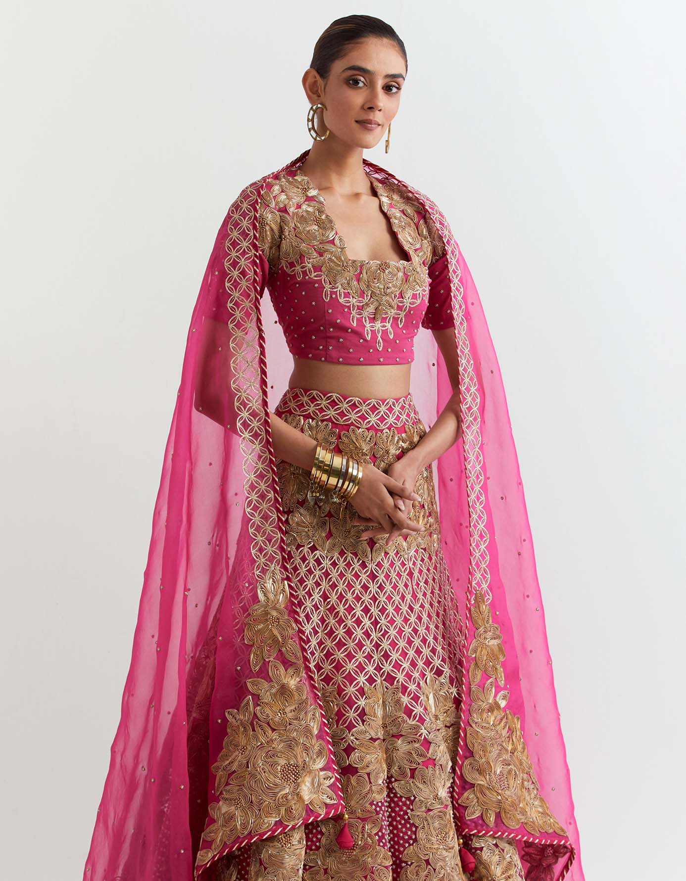 Fuchsia all over embroidered skirt in exquisite gota embroidery paired with organza silk dupatta and stretch lycra blouse