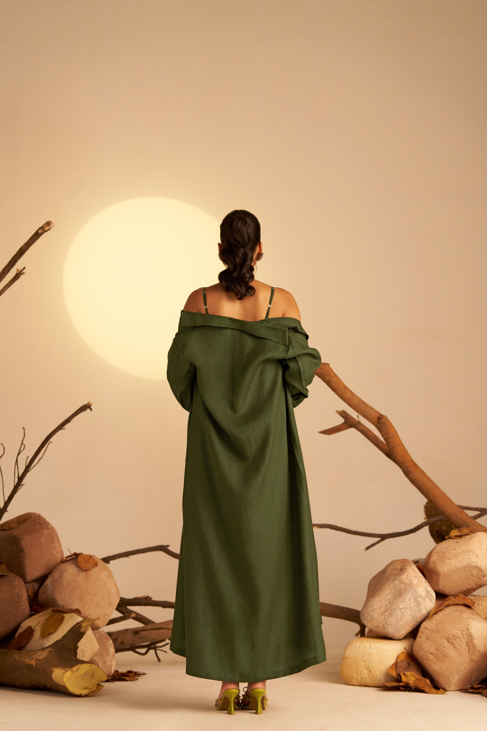 A Chic Two-In-One Ensemble Featuring A Sleek Olive Green Slip Dress